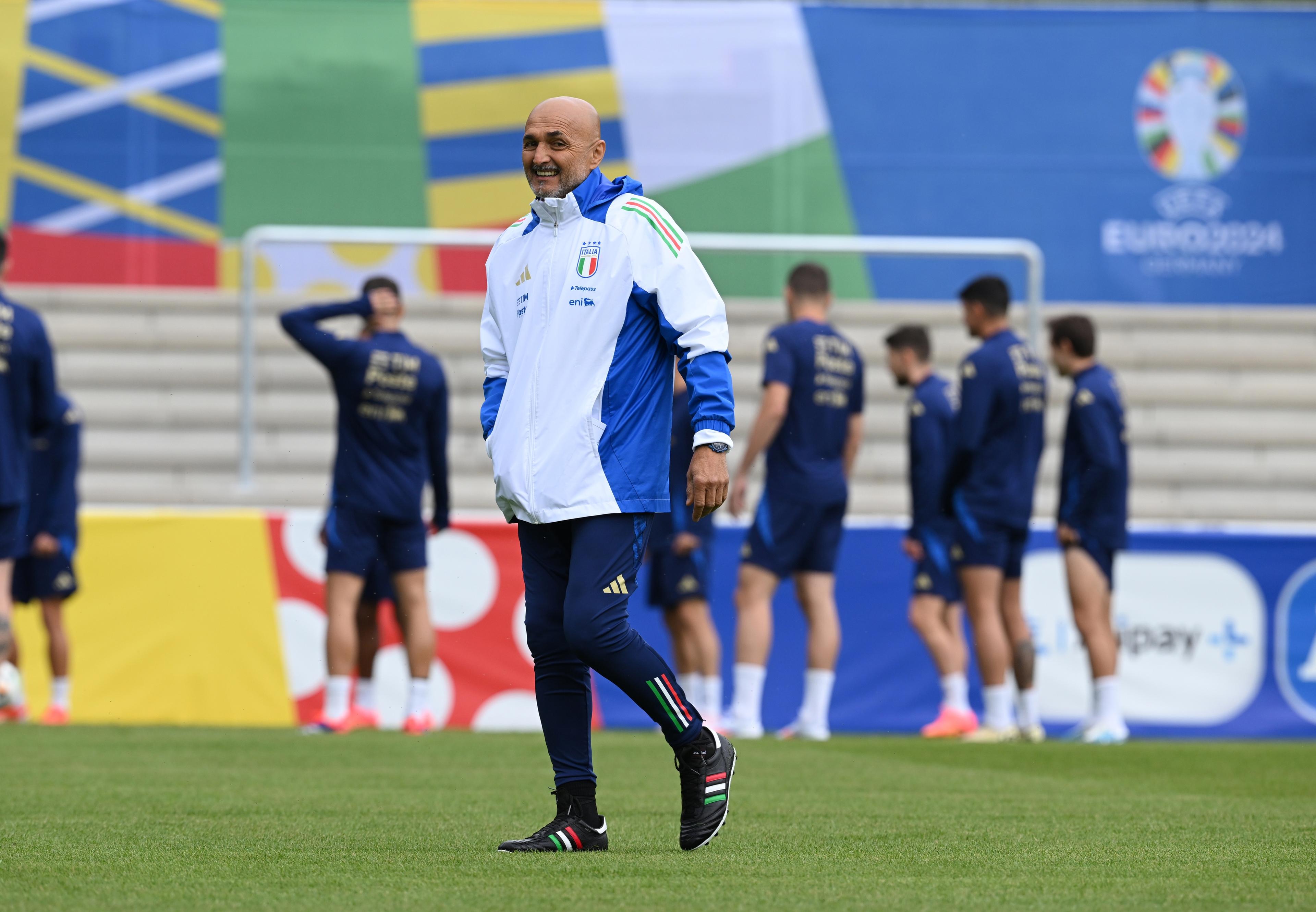 ISERLOHN, GERMANY - JUNE 12: Head coach of Italy Luciano Spalletti smiles during an Italy training session at Hemberg-Stadion on June 12, 2024 in Iserlohn, Germany. (Photo by Claudio Villa/Getty Images for FIGC)