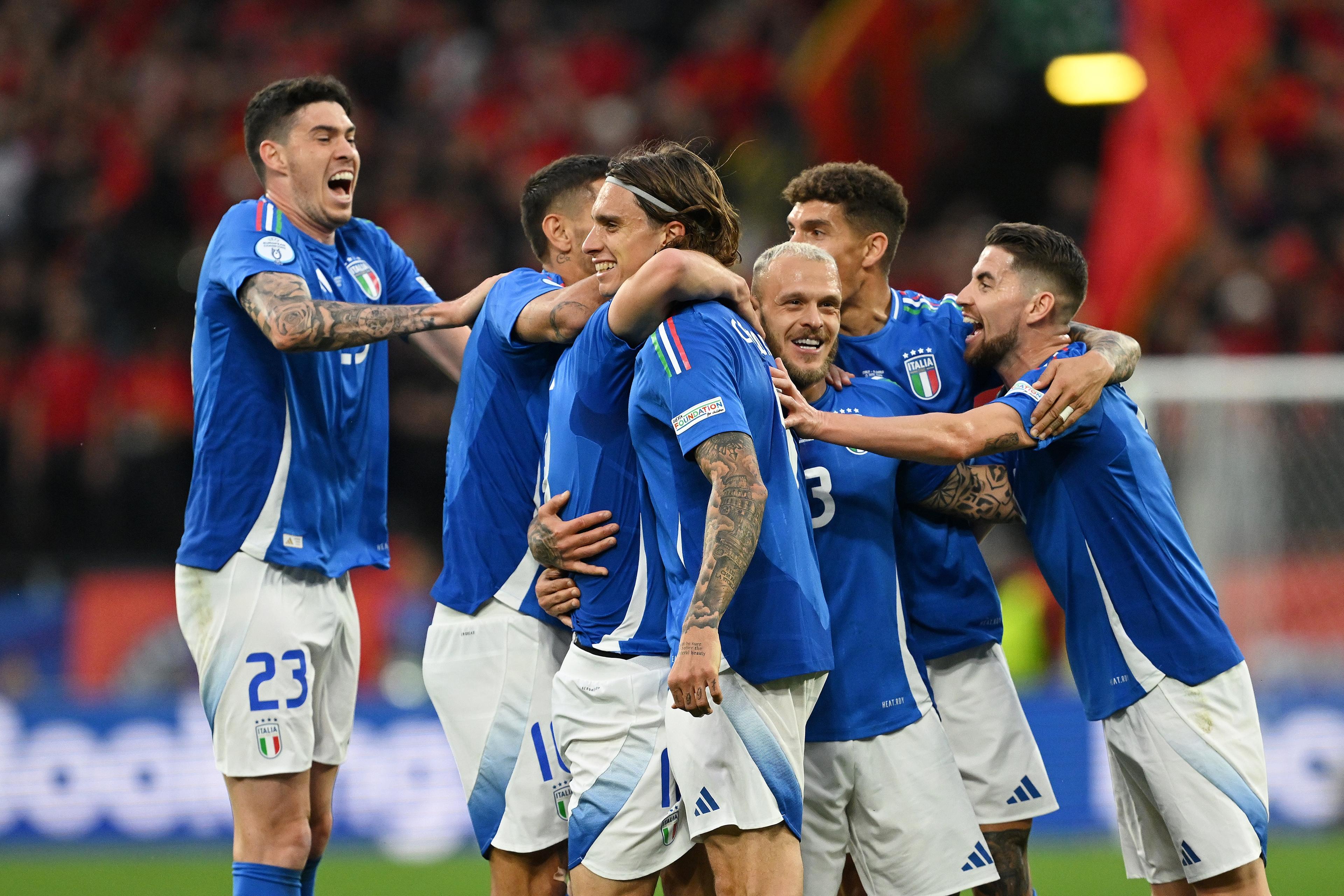 DORTMUND, GERMANY - JUNE 15: Nicolo Barella of Italy (hidden) celebrates scoring his team\\'s second goal with teammates during the UEFA EURO 2024 group stage match between Italy and Albania at Football Stadium Dortmund on June 15, 2024 in Dortmund, Germany. (Photo by Claudio Villa/Getty Images for FIGC)