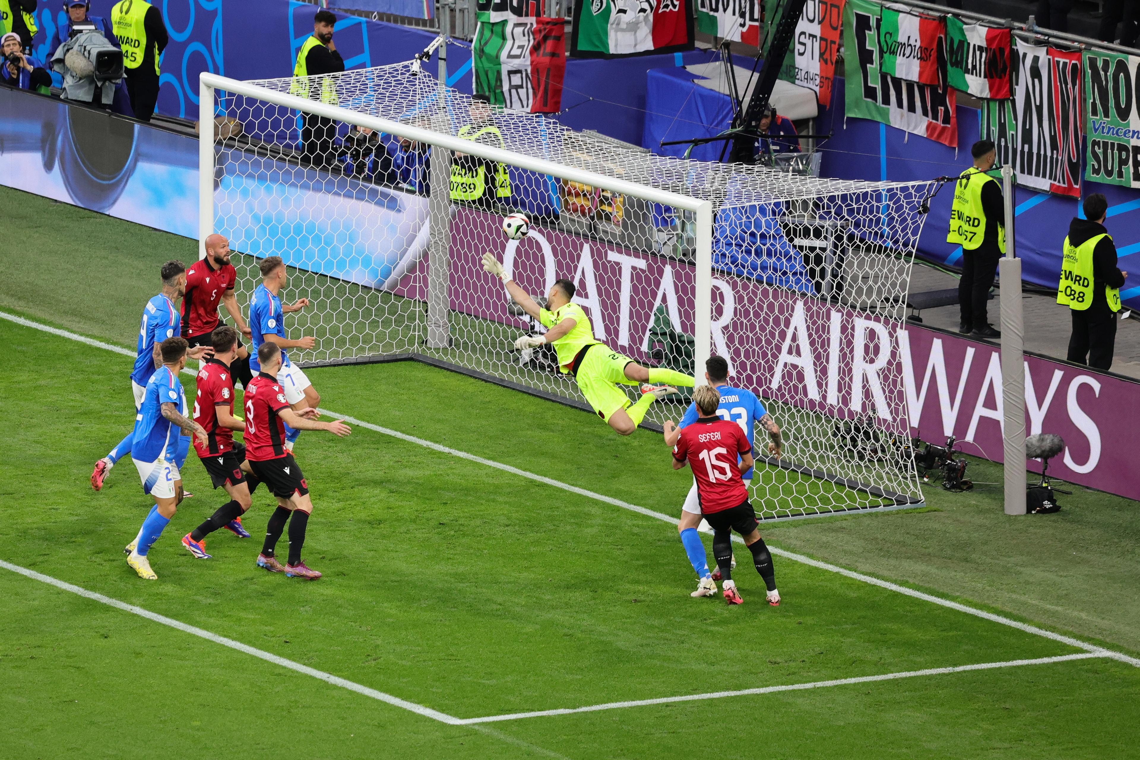 DORTMUND, GERMANY - JUNE 15: Alessandro Bastoni #23 of Italy scores his team's first goal past Thomas Strakosha of Albania during the UEFA EURO 2024 group stage match between Italy and Albania at Football Stadium Dortmund on June 15, 2024 in Dortmund, Germany (Photo by Andreas Rentz - UEFA/UEFA via Getty Images)