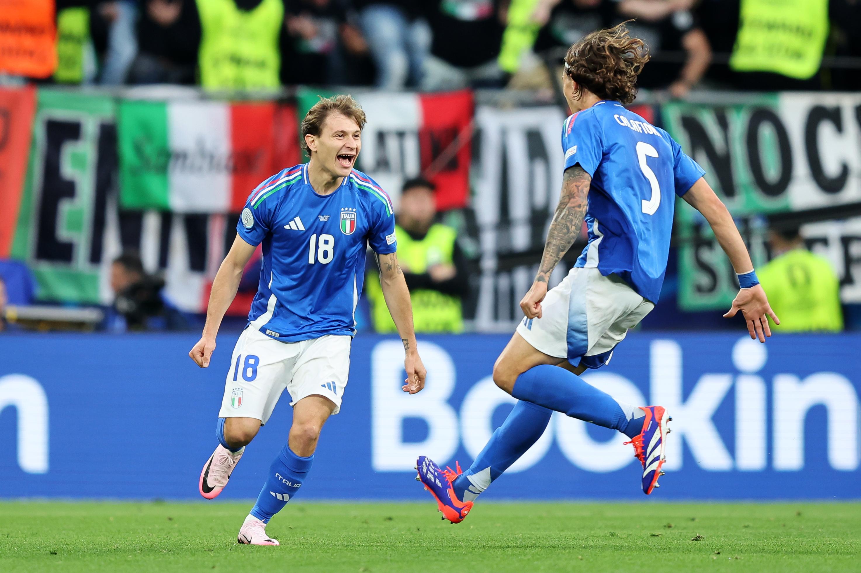 DORTMUND, GERMANY - JUNE 15: Nicolo Barella of Italy celebrates scoring his team's second goal with teammate Riccardo Calafiori during the UEFA EURO 2024 group stage match between Italy and Albania at Football Stadium Dortmund on June 15, 2024 in Dortmund, Germany. (Photo by Matt McNulty - UEFA/UEFA via Getty Images)