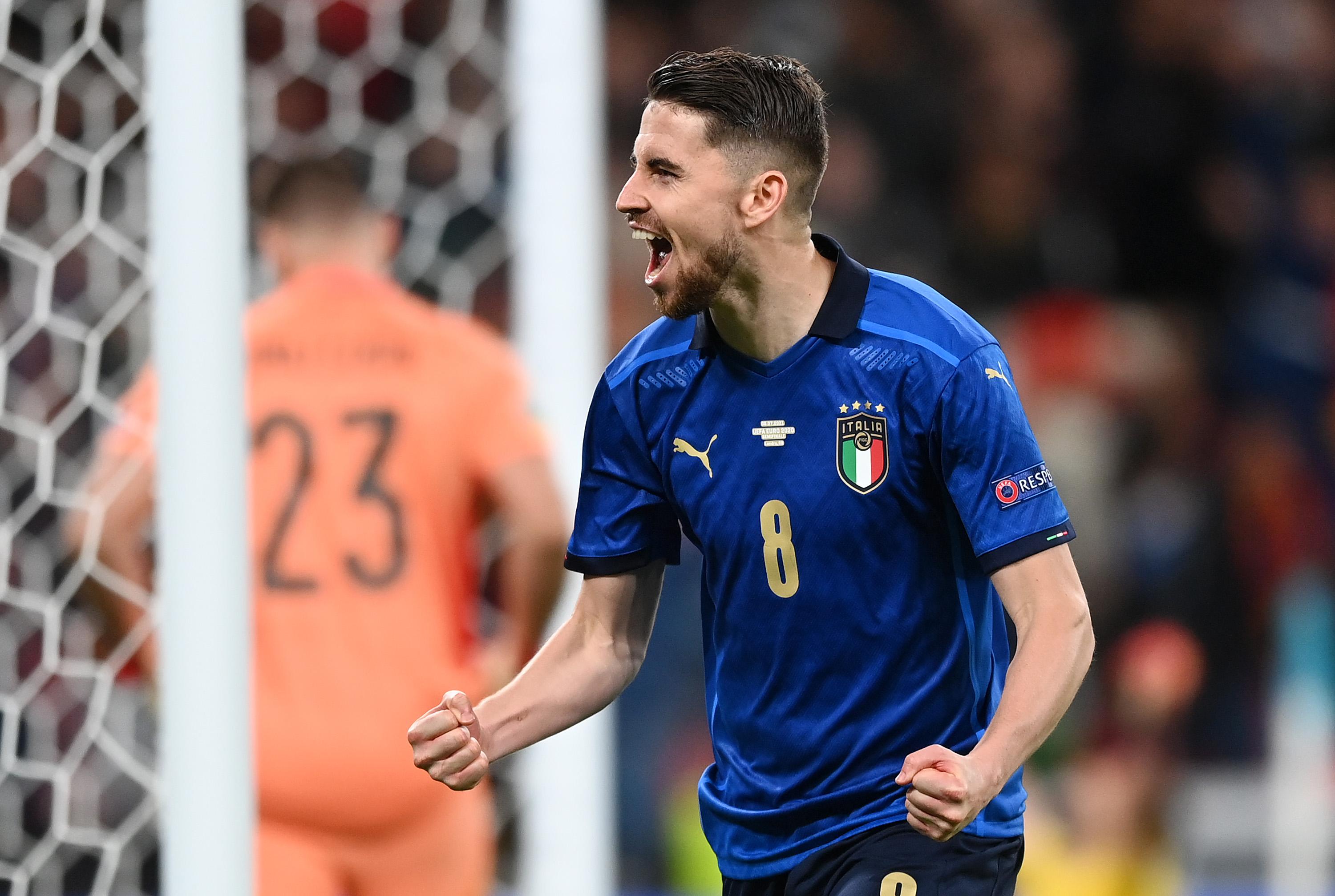 LONDON, ENGLAND - JULY 06: Jorginho of Italy celebrates after scoring the winning penalty in a penalty shoot out during the UEFA Euro 2020 Championship Semi-final match between Italy and Spain at Wembley Stadium on July 06, 2021 in London, England. (Photo by Shaun Botterill - UEFA/UEFA via Getty Images)