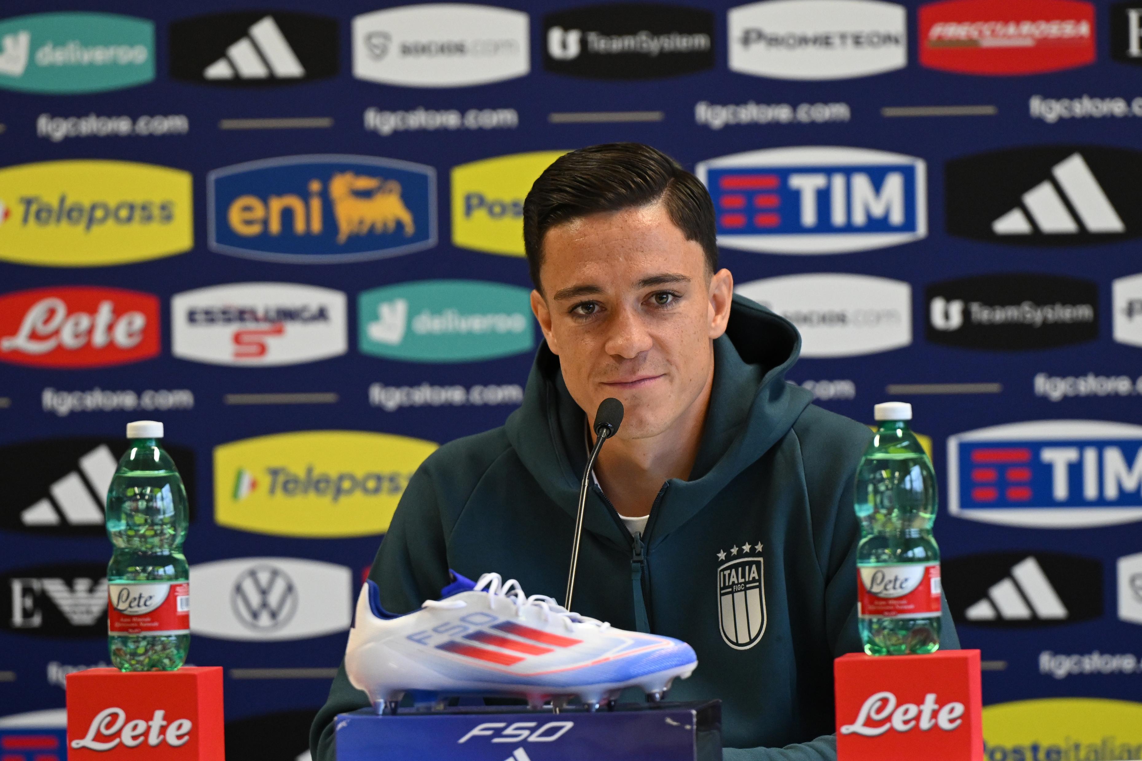 ISERLOHN, GERMANY - JUNE 18: Giacomo Raspadori of Italy speaks with the media during Italy press conference at Hemberg-Stadion on June 18, 2024 in Iserlohn, Germany. (Photo by Claudio Villa/Getty Images for FIGC)