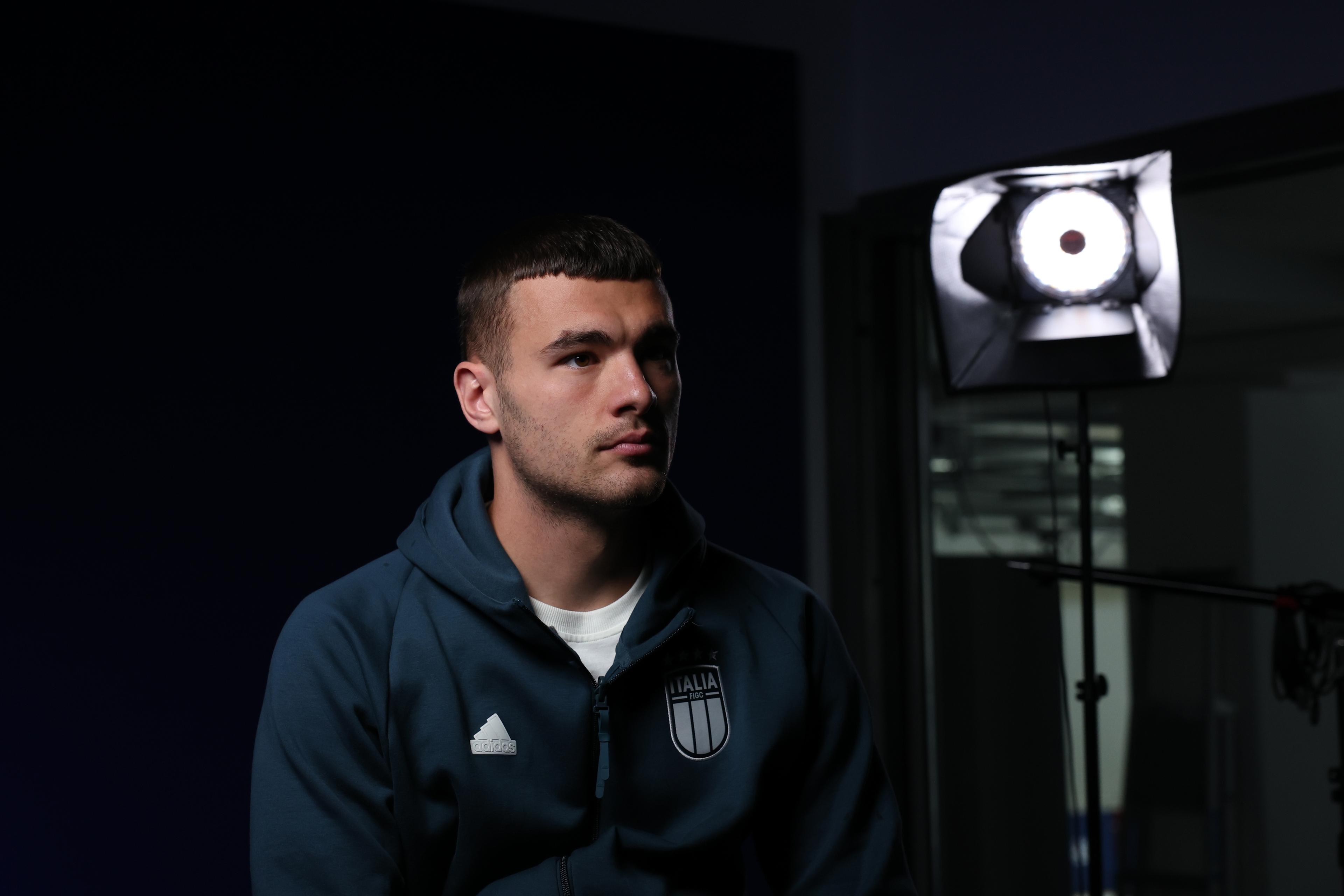 ISERLOHN, GERMANY - JUNE 18: Alessandro Buongiorno of Italy speaks with the media during Italy press conference at Hemberg-Stadion on June 18, 2024 in Iserlohn, Germany. (Photo by Claudio Villa/Getty Images for FIGC)