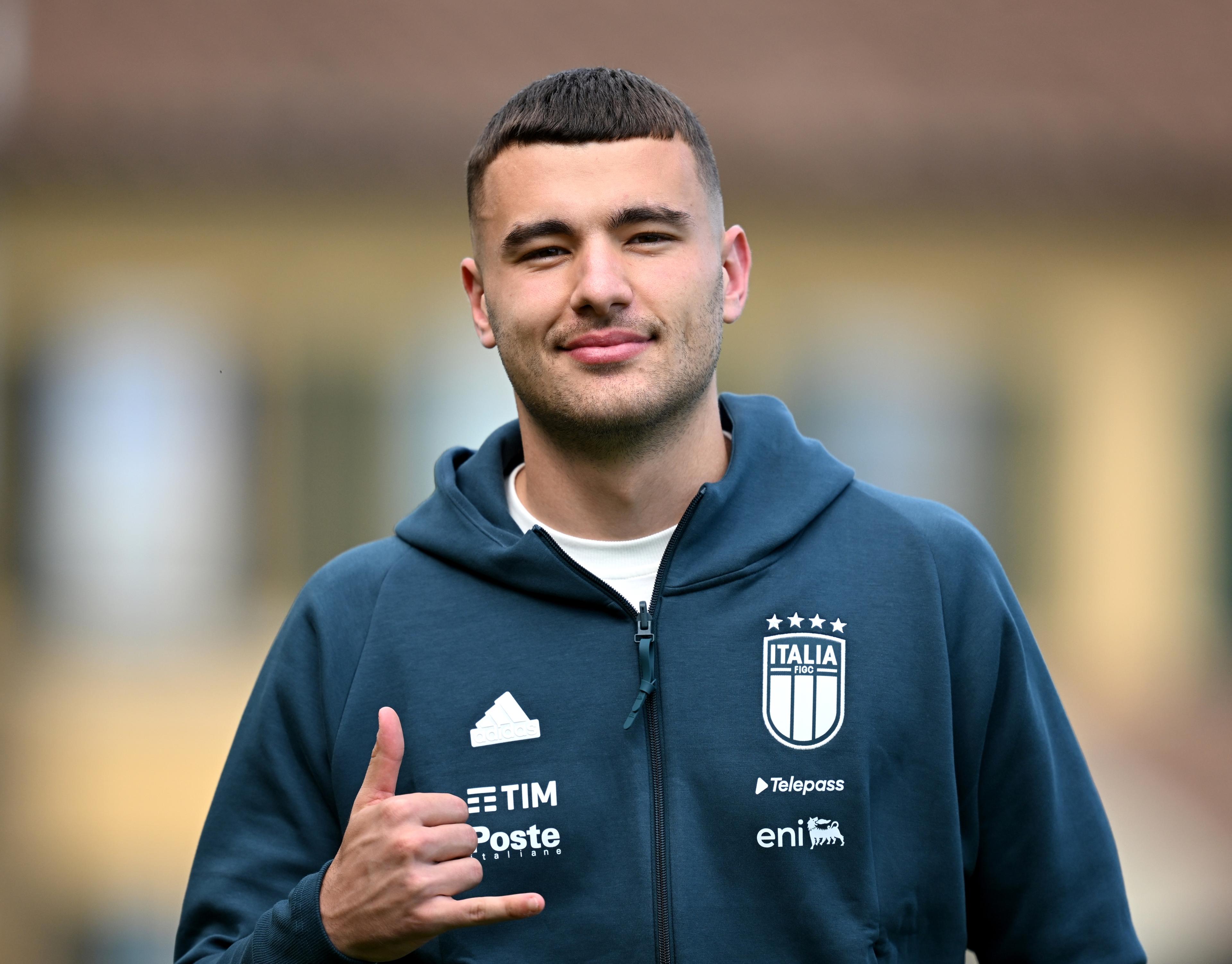 FLORENCE, ITALY - MAY 31: Alessandro Buongiorno of Italy smiles at Centro Tecnico Federale di Coverciano on May 31, 2024 in Florence, Italy. (Photo by Claudio Villa/Getty Images)