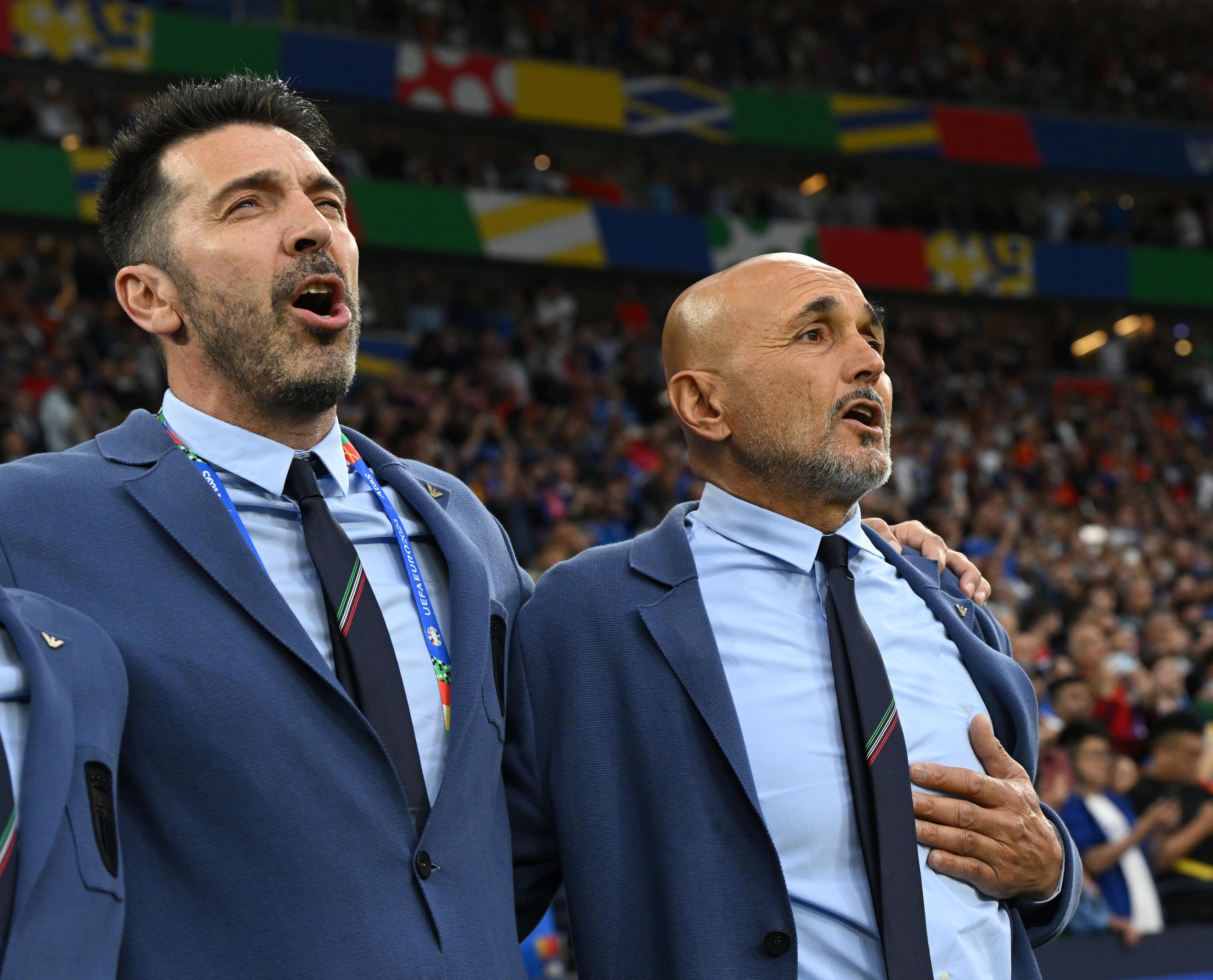 GELSENKIRCHEN, GERMANY - JUNE 20: Luciano Spalletti, Head Coach of Italy and head of Italy delegation Gianluigi Buffon sing the national anthem prior to the UEFA EURO 2024 group stage match between Spain and Italy at Arena AufSchalke on June 20, 2024 in Gelsenkirchen, Germany. (Photo by Claudio Villa/Getty Images for FIGC)