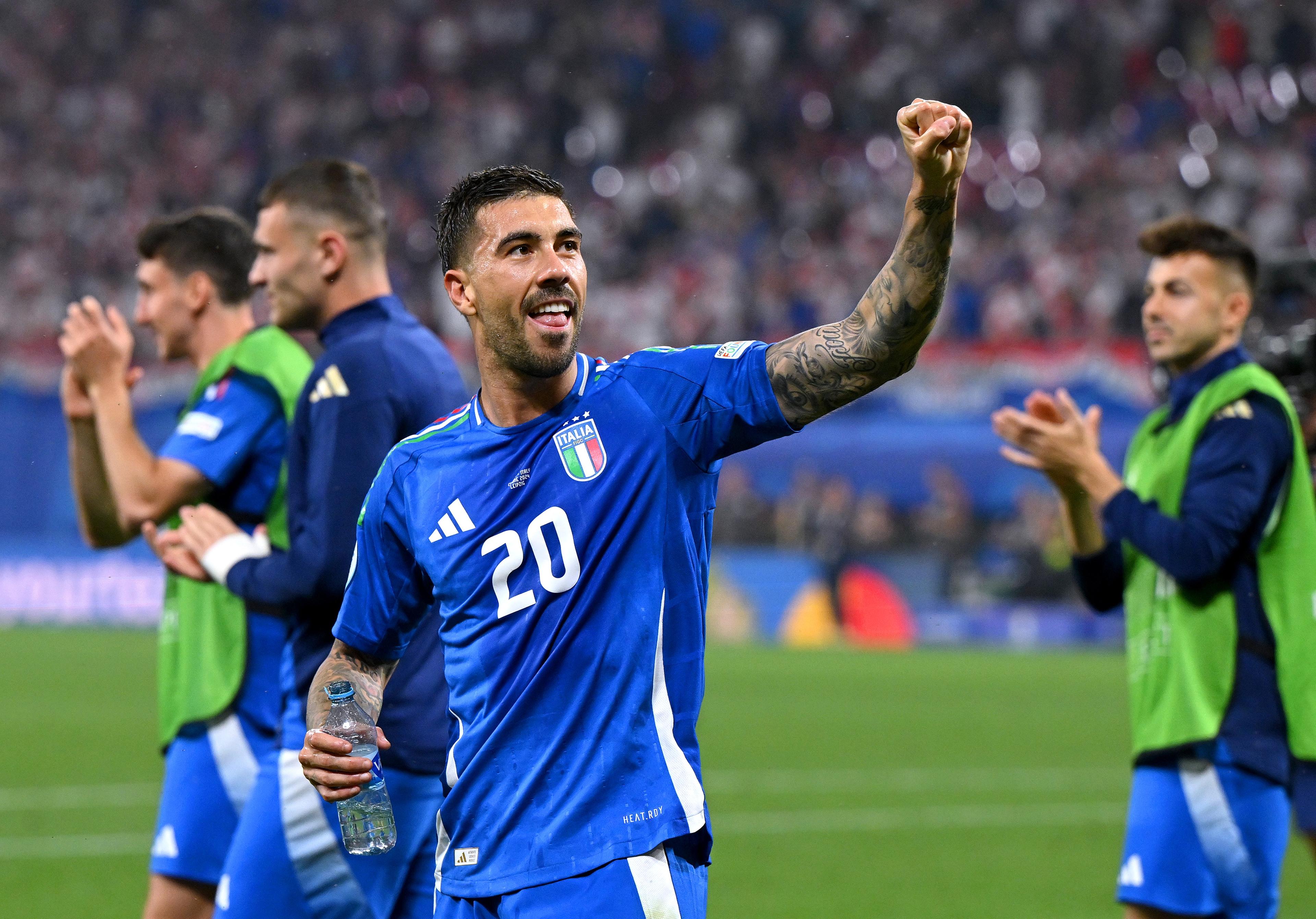 LEIPZIG, GERMANY - JUNE 24: Mattia Zaccagni of Italy celebrates with teammates after scoring his team's first goal to equalise during the UEFA EURO 2024 group stage match between Croatia and Italy at Football Stadium Leipzig on June 24, 2024 in Leipzig, Germany. (Photo by Claudio Villa/Getty Images for FIGC)