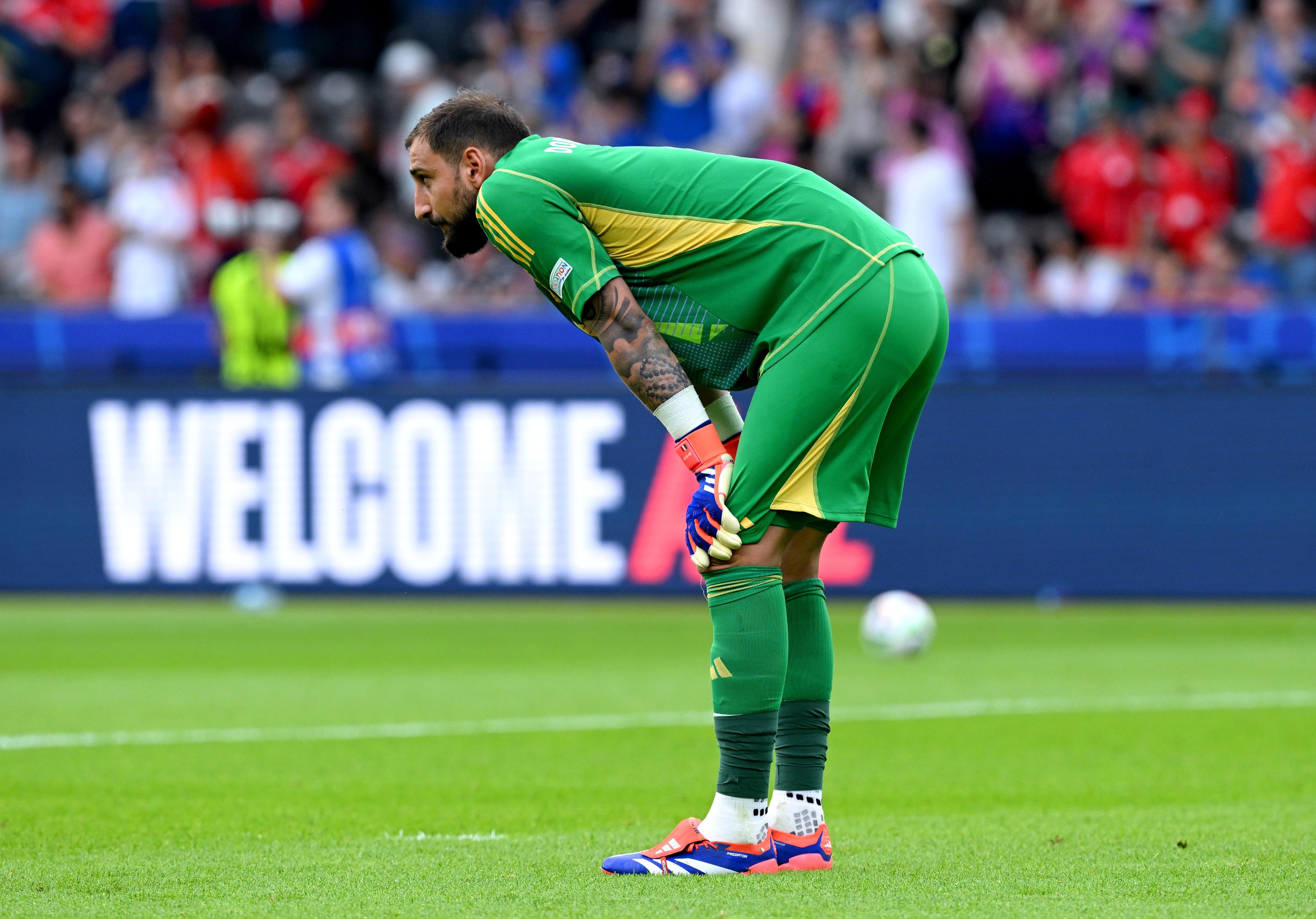 BERLIN, GERMANY - JUNE 29: Gianluigi Donnarumma of Italy, looks dejected after the team's elimination from the tournament following the UEFA EURO 2024 round of 16 match between Switzerland and Italy at Olympiastadion on June 29, 2024 in Berlin, Germany. (Photo by Claudio Villa/Getty Images for FIGC)
