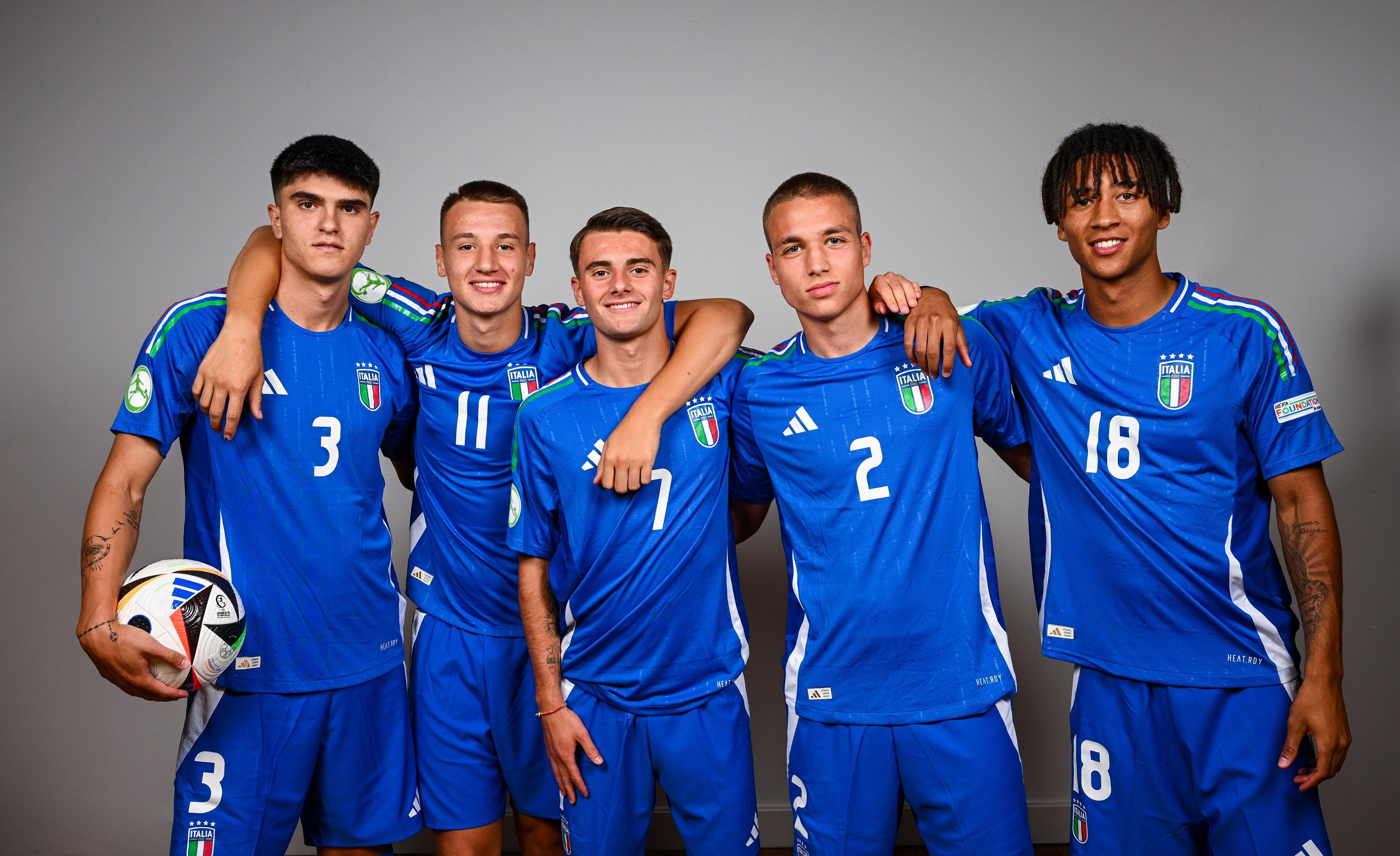 BELFAST, NORTHERN IRELAND - JULY 13: Italy players, from left, Davide Bartesaghi, Francesco Camarda, Diego Sia, Vittorio Magni and Kevin Zeroli during a Italy squad portrait session at the UEFA European Under-19 Championship 2024 finals tournament on July 13, 2024 in Belfast, Northern Ireland. (Photo by Ramsey Cardy - Sportsfile/UEFA via Getty Images)
