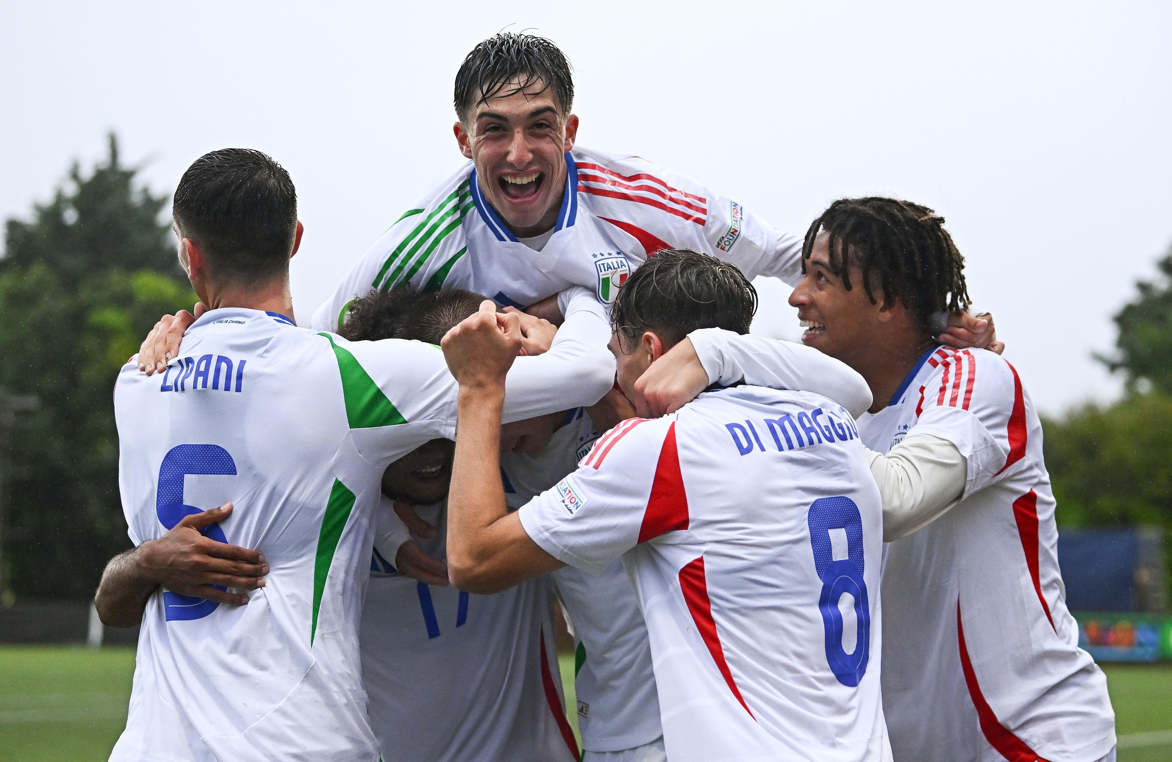 LARNE, NORTHERN IRELAND - JULY 18: Francesco Camarda of Italy, hidden, celebrates with teammates after scoring their side's second goal during the UEFA European Under-19 Championship 2024 Group A match between Northern Ireland and Italy at Inver Park on July 18, 2024 in Larne, Northern Ireland. (Photo by Seb Daly - Sportsfile/UEFA via Getty Images)