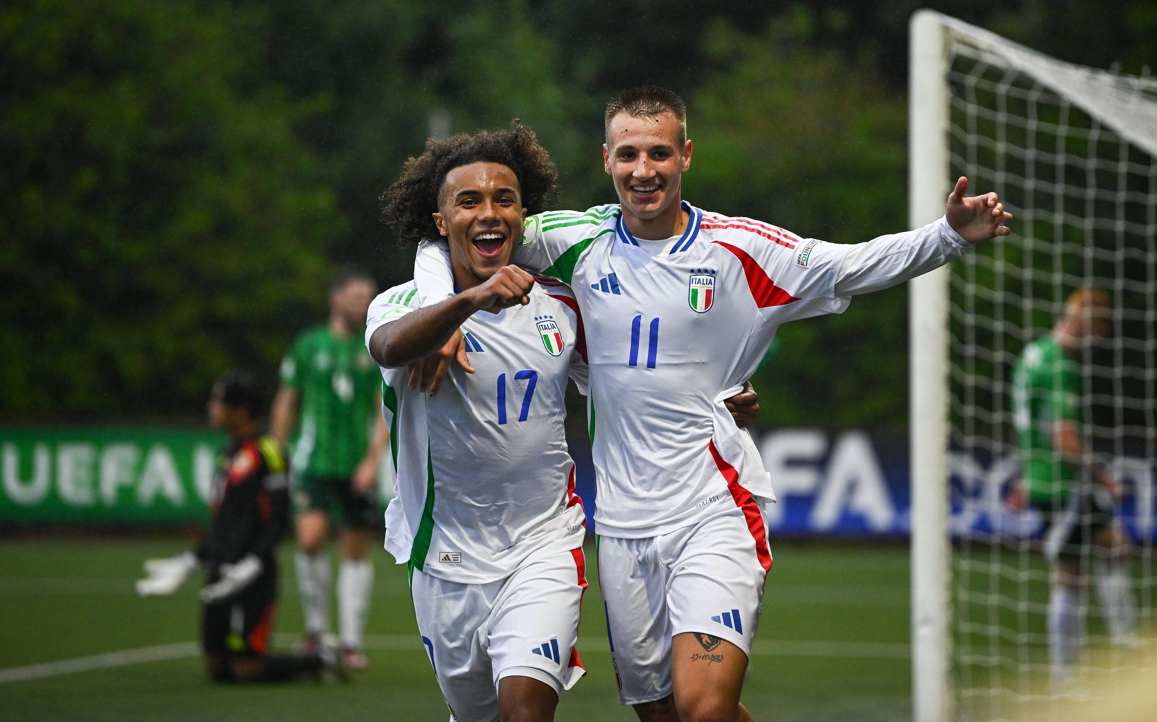 LARNE, NORTHERN IRELAND - JULY 18: Francesco Camarda of Italy, right, celebrates with teammate Aaron Ciammaglichella after scoring their side's second goal during the UEFA European Under-19 Championship 2024 Group A match between Northern Ireland and Italy at Inver Park on July 18, 2024 in Larne, Northern Ireland. (Photo by Seb Daly - Sportsfile/UEFA via Getty Images)