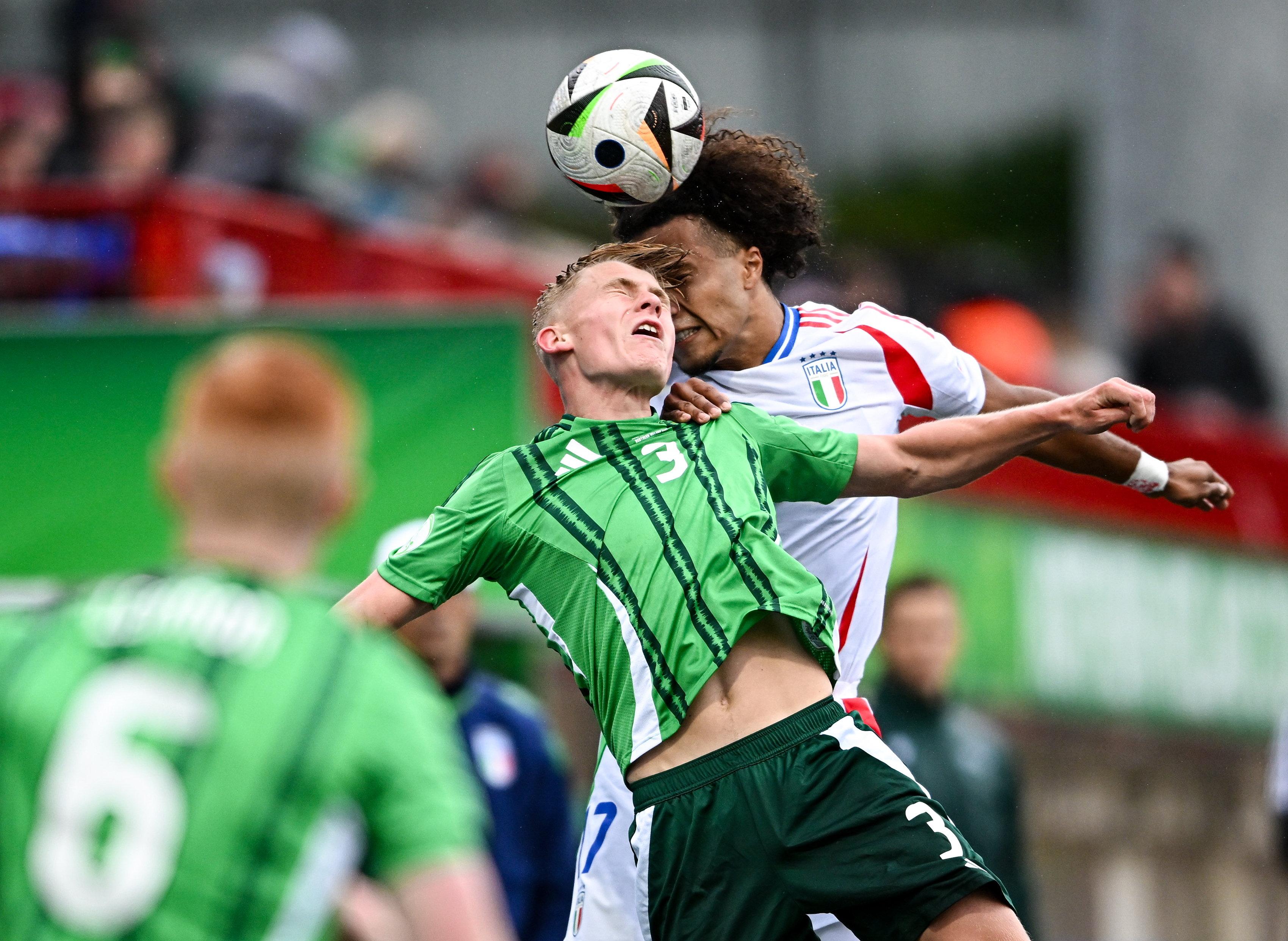LARNE, NORTHERN IRELAND - JULY 18: Joel Thompson of Northern Ireland and Aaron Ciammaglichella of Italy during the UEFA European Under-19 Championship 2024 Group A match between Northern Ireland and Italy at Inver Park on July 18, 2024 in Larne, Northern Ireland. (Photo by Seb Daly - Sportsfile/UEFA via Getty Images)
