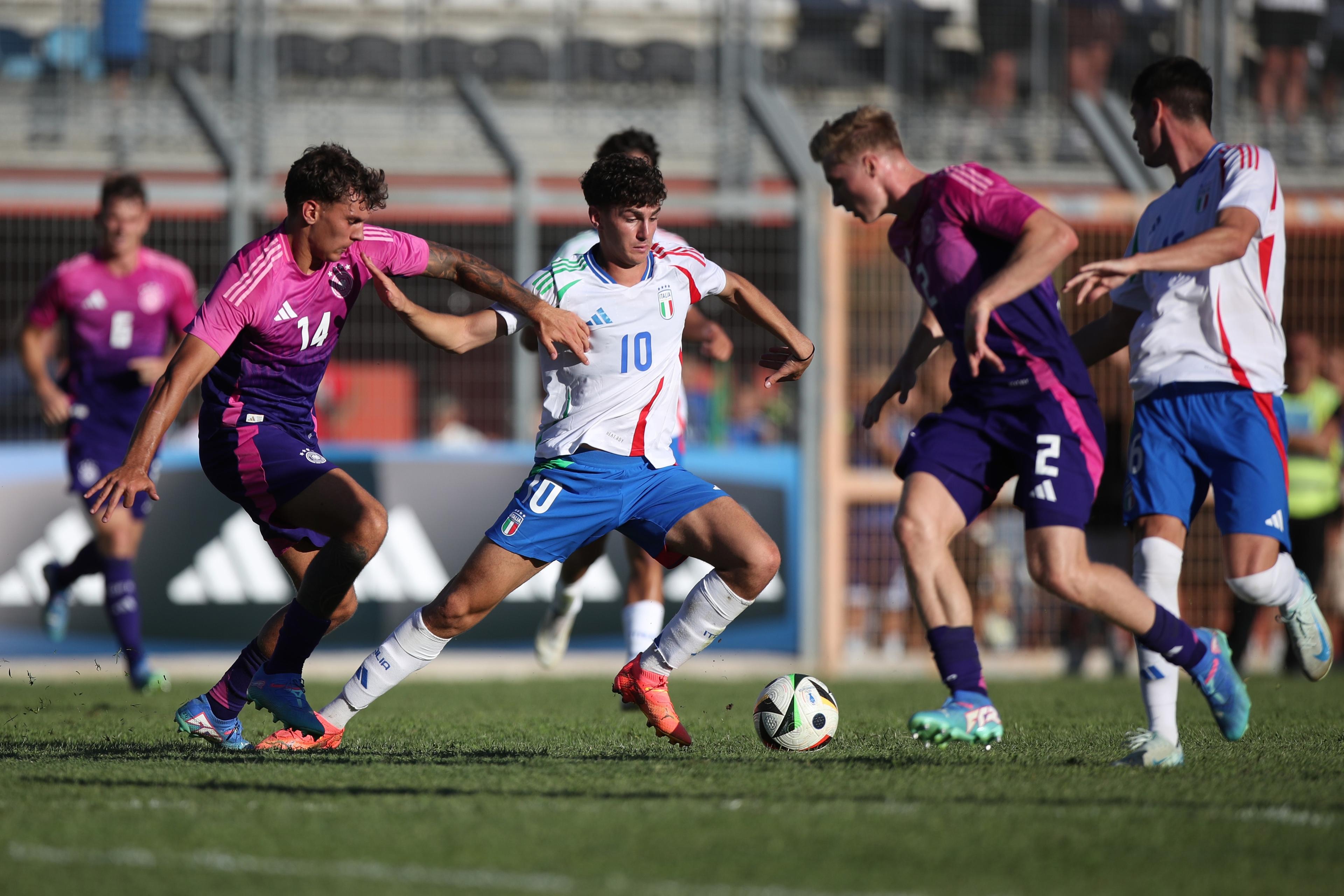 RIETI, ITALY - SEPTEMBER 10:  Lorenzo Anghele of Italy U20 competes for the ball with Julian Pauli of Germany U20 during the Elite Tournament match between Italy U20 and Germany U20 at Stadio Centro D\\'Italia on September 10, 2024 in Rieti, Italy. (Photo by Paolo Bruno/Getty Images)