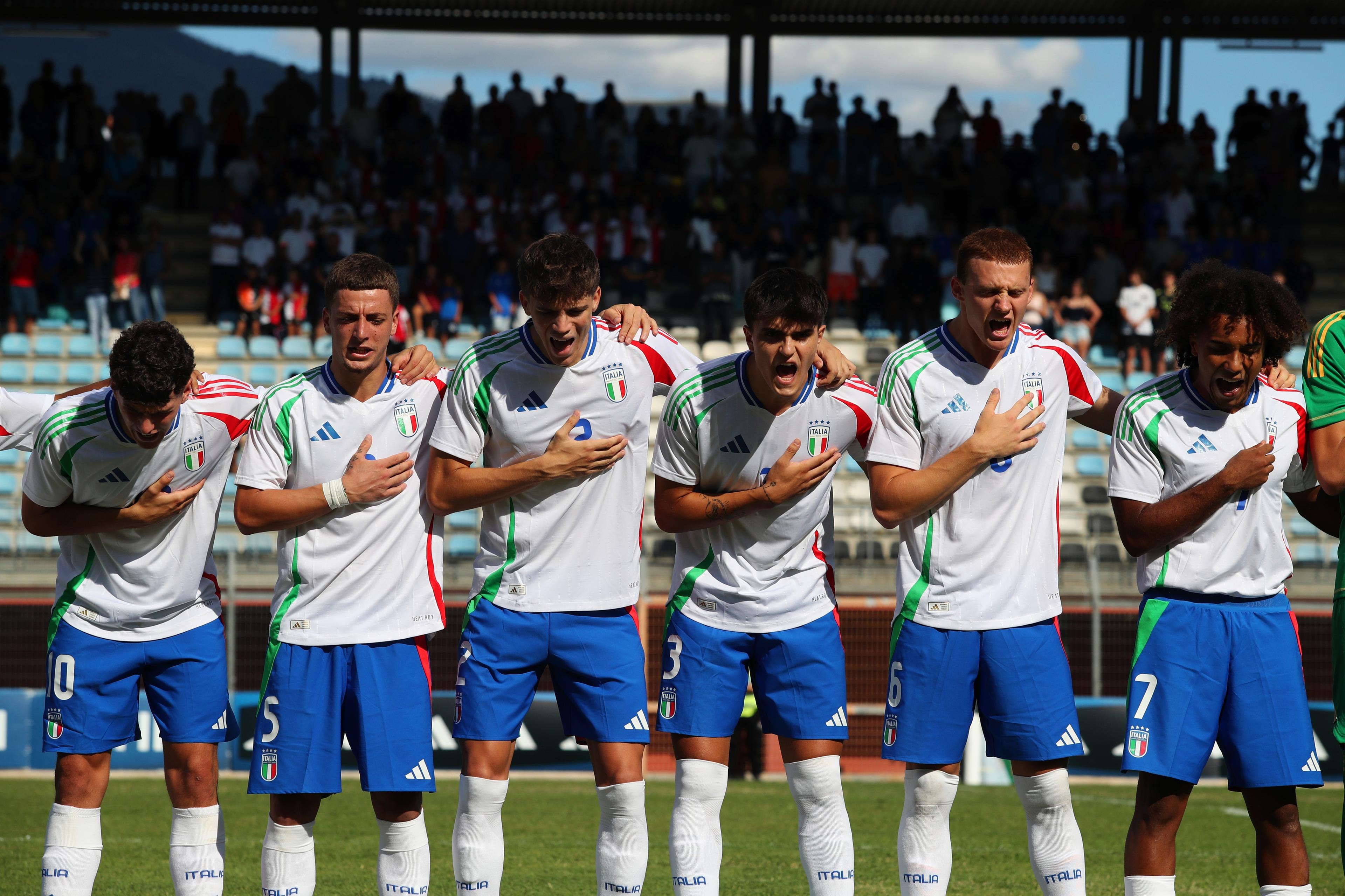 RIETI, ITALY - SEPTEMBER 10: Italy U20 players react during their National Anthem before the Elite Tournament match between Italy U20 and Germany U20 at Stadio Centro D'Italia on September 10, 2024 in Rieti, Italy. (Photo by Paolo Bruno/Getty Images)