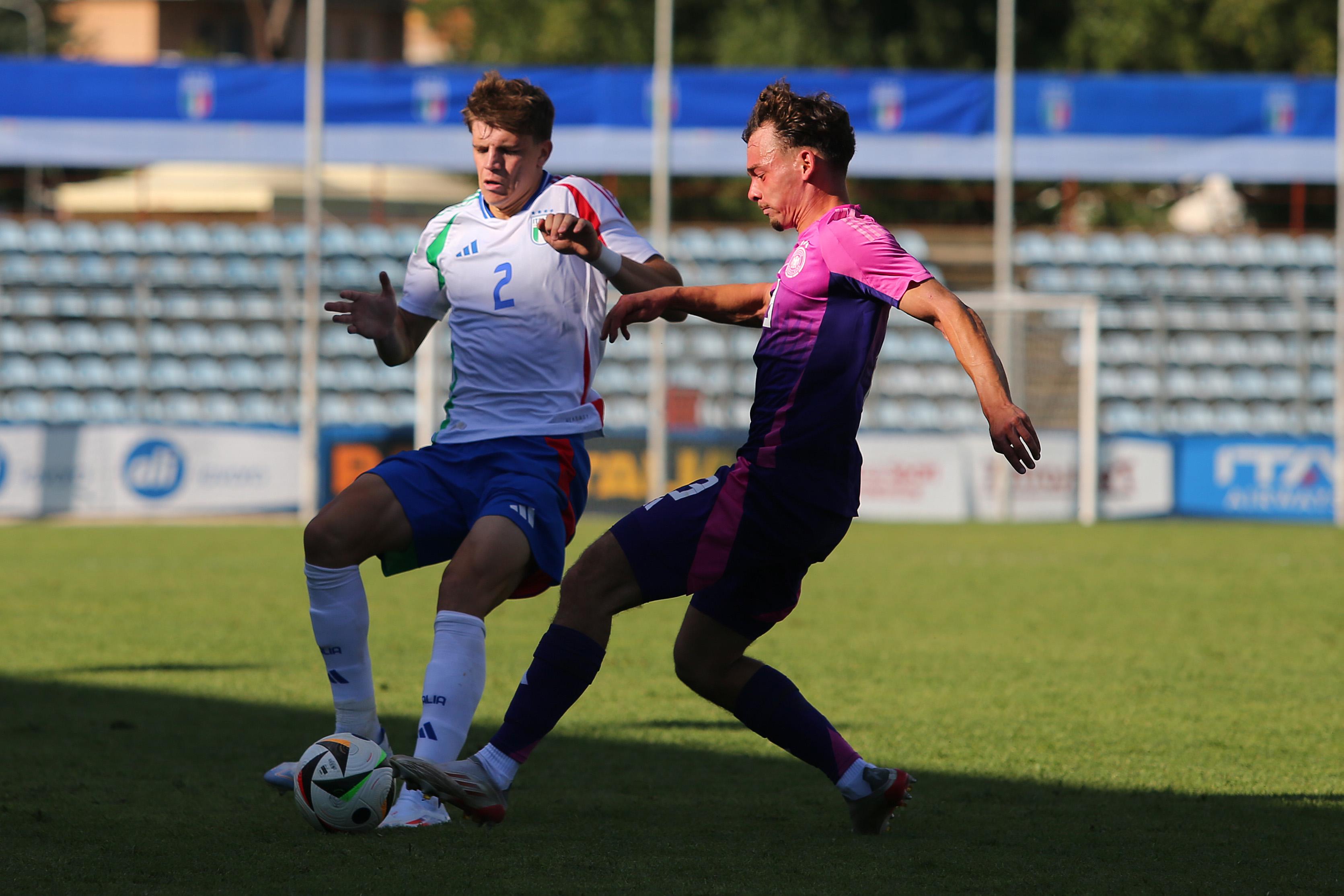 RIETI, ITALY - SEPTEMBER 10: Marco Palestra of Italy U20 competes for the ball with Aaron Zehnter of Germany U20 during the Elite Tournament match between Italy U20 and Germany U20 at Stadio Centro D'Italia on September 10, 2024 in Rieti, Italy. (Photo by Paolo Bruno/Getty Images)