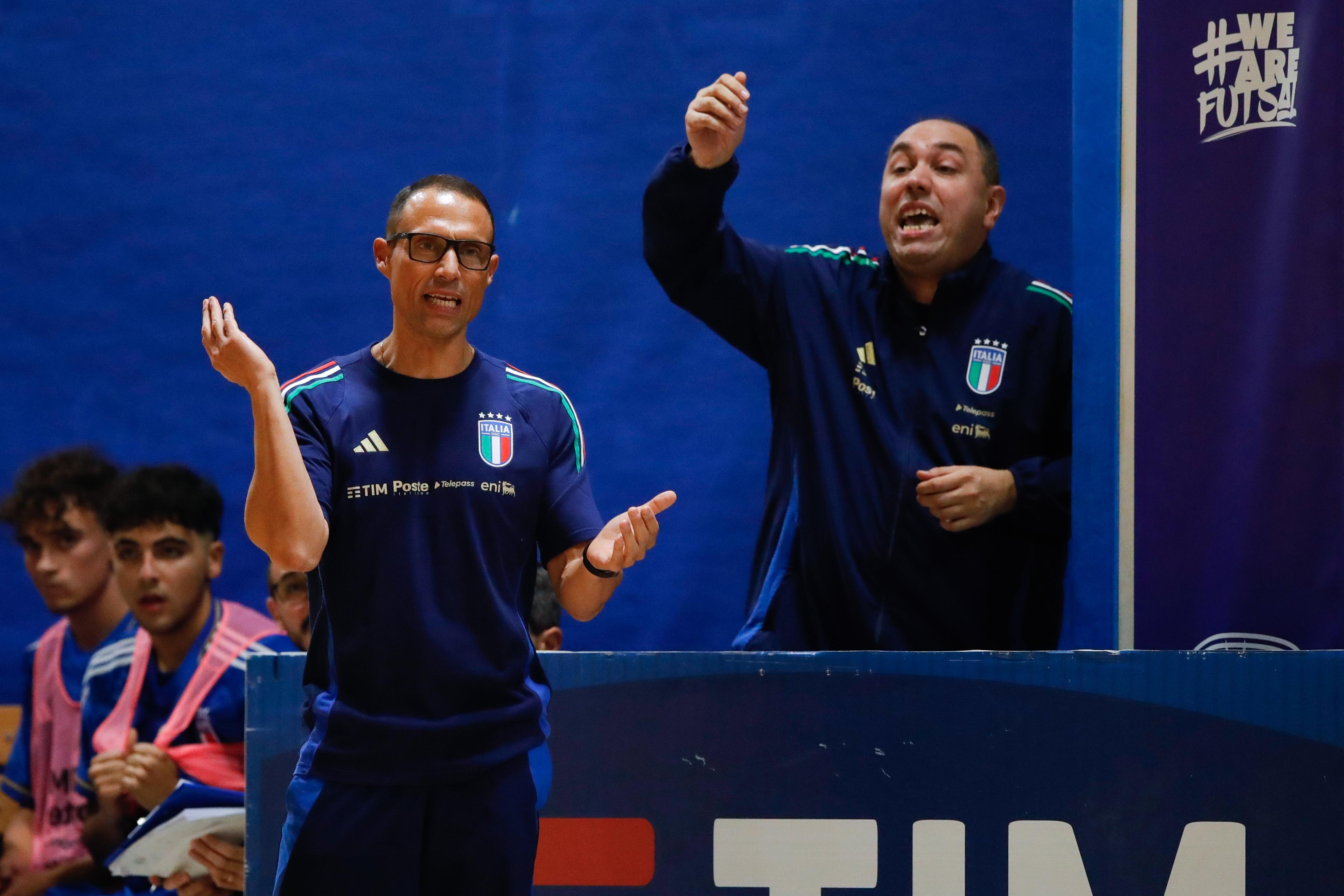 TREVISO, ITALY - OCTOBER 22: Italian Head Coach Vanni Pedrini (L) during the International Friendly between Italy U19 and Finland U19 at Palamaser on October 22, 2024 in Treviso, Italy. (Photo by FIGC/FIGC via Getty Images)