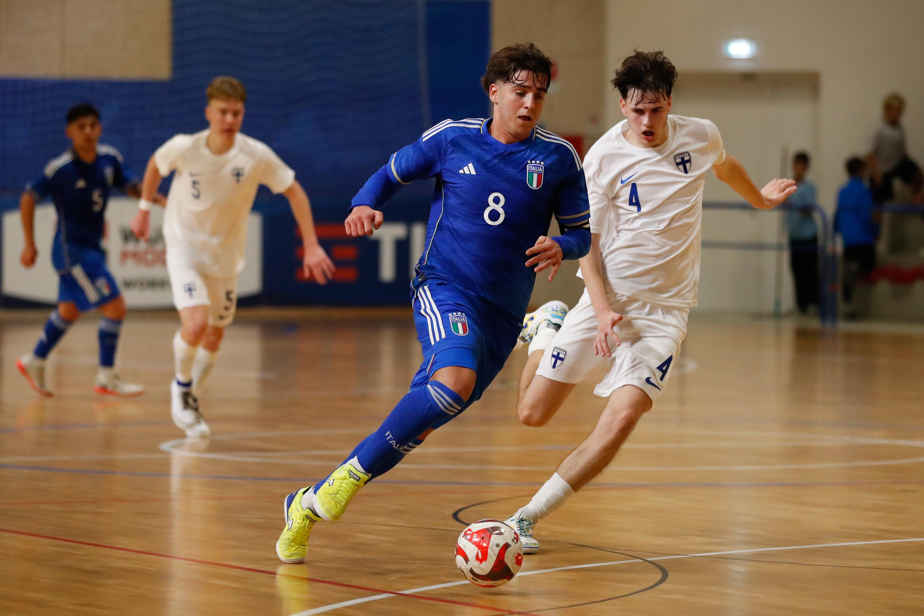 TREVISO, ITALY - OCTOBER 22: Tommaso Ceccarelli of Italy and Denis Kokachev of Finland in action during the International Friendly between Italy U19 and Finland U19 at Palamaser on October 22, 2024 in Treviso, Italy. (Photo by FIGC/FIGC via Getty Images)