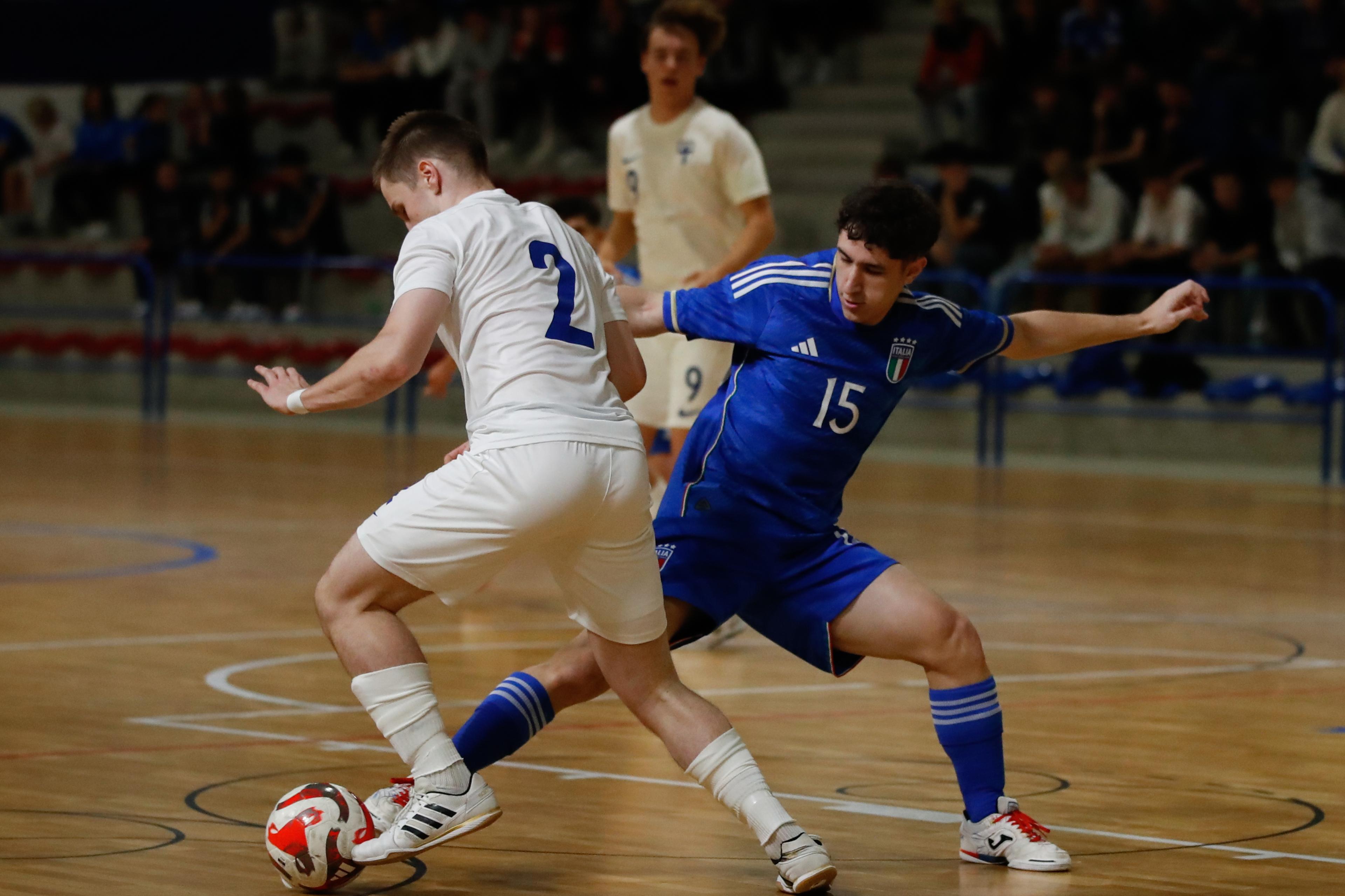 TREVISO, ITALY - OCTOBER 22: Enzo Moratelli of Italy and Kimi Heikkila of Finland in actio during the International Friendly between Italy U19 and Finland U19 at Palamaser on October 22, 2024 in Treviso, Italy. (Photo by FIGC/FIGC via Getty Images)