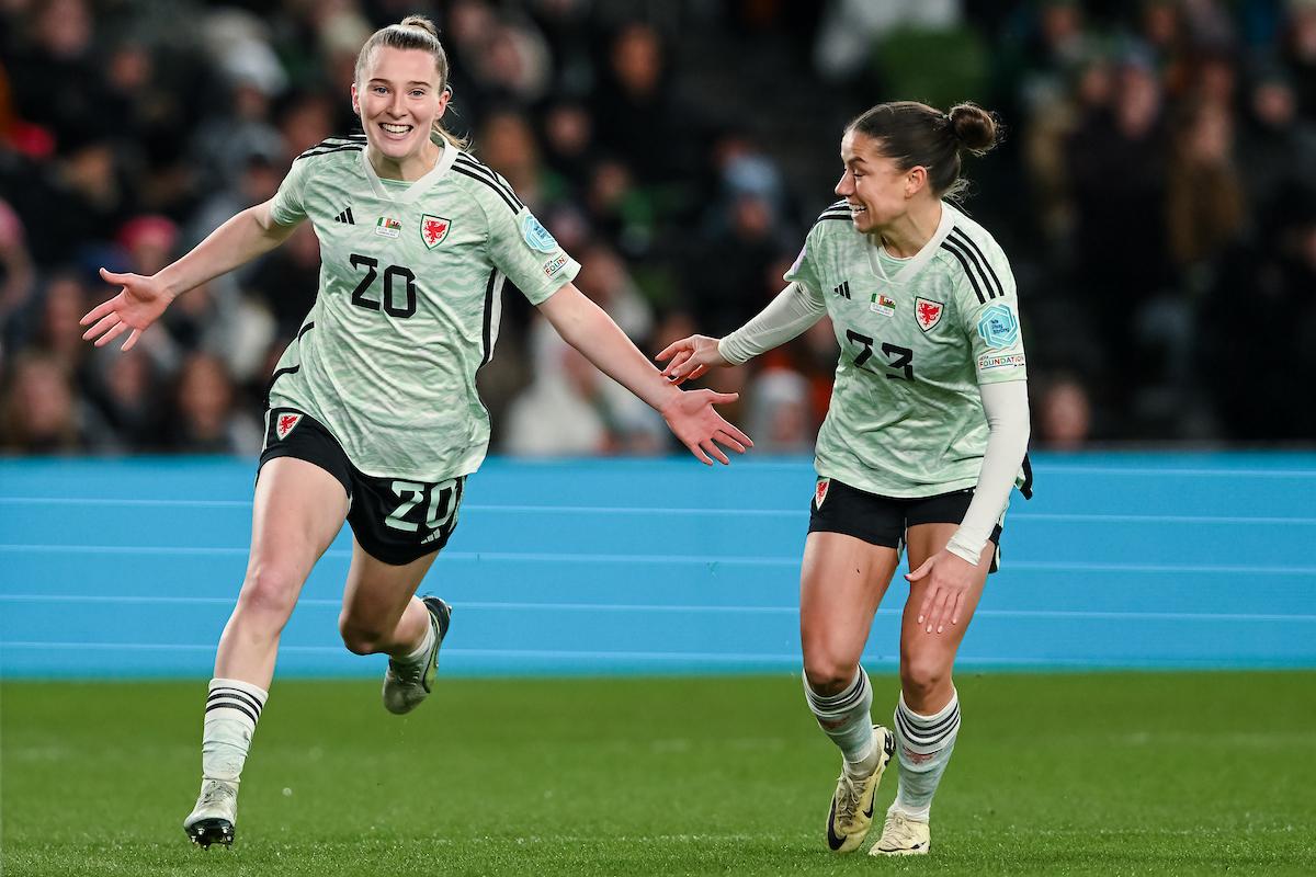 DUBLIN, IRELAND - 03 DECEMBER 2024: Wales' Carrie Jones scores Wales 2nd goal of the game and celebrate 0-2 during the 2025 European Women's Championship, WEQ Play-offs Round 2 match between Republic of Ireland and Wales at The Aviva Stadium in Dublin on the 3rd November 2024. (Pic by Ashley Crowden/FAW)