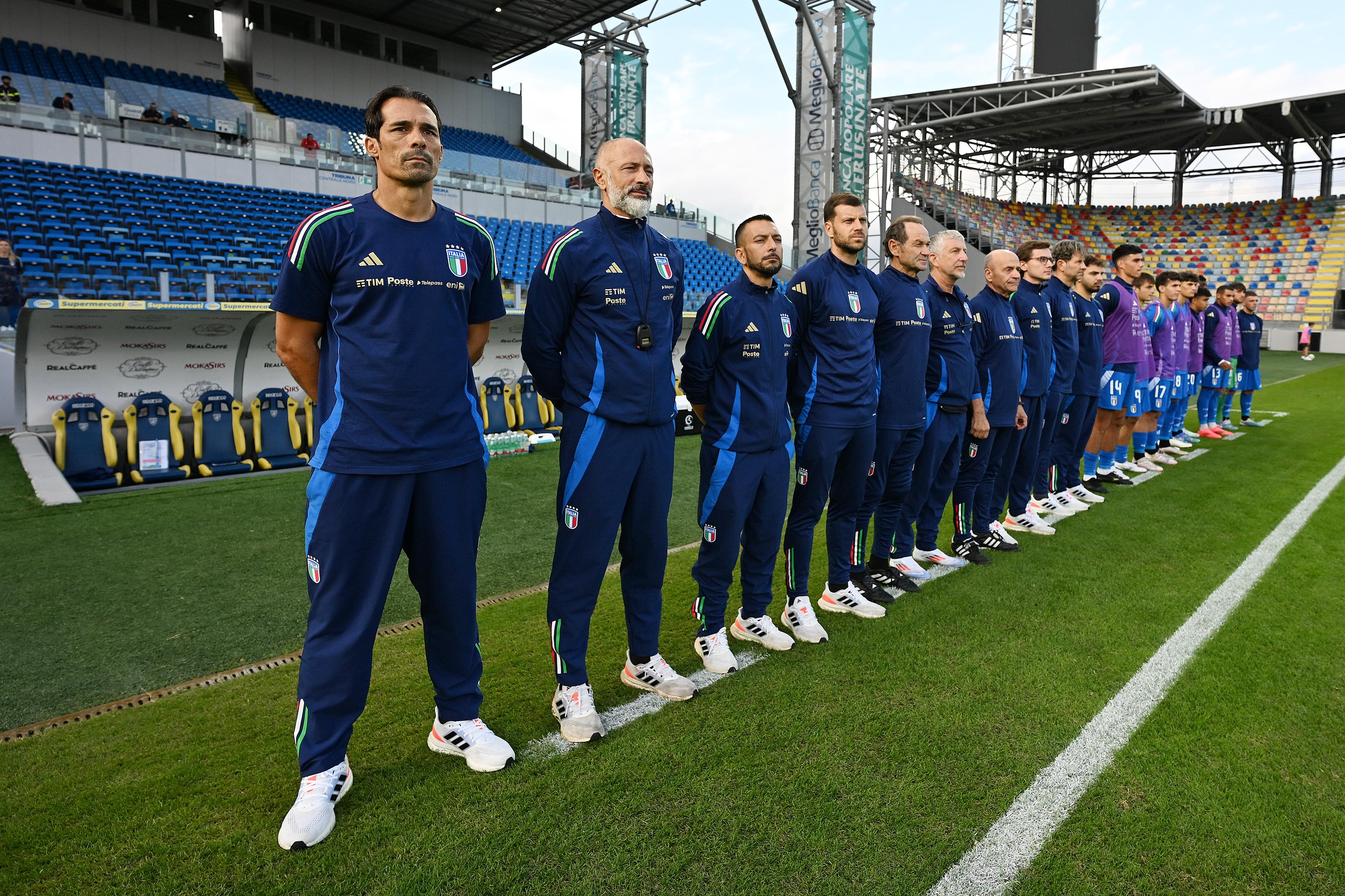 FROSINONE, ITALY - OCTOBER 10: Bernardo Corradi Italy U20 head coach and his staff during their national anthem before the Elite League match between Italy U20 and England U20 at Stadio Benito Stirpe on October 10, 2024 in Frosinone, Italy. (Photo by Francesco Pecoraro - FIGC/FIGC via Getty Images)