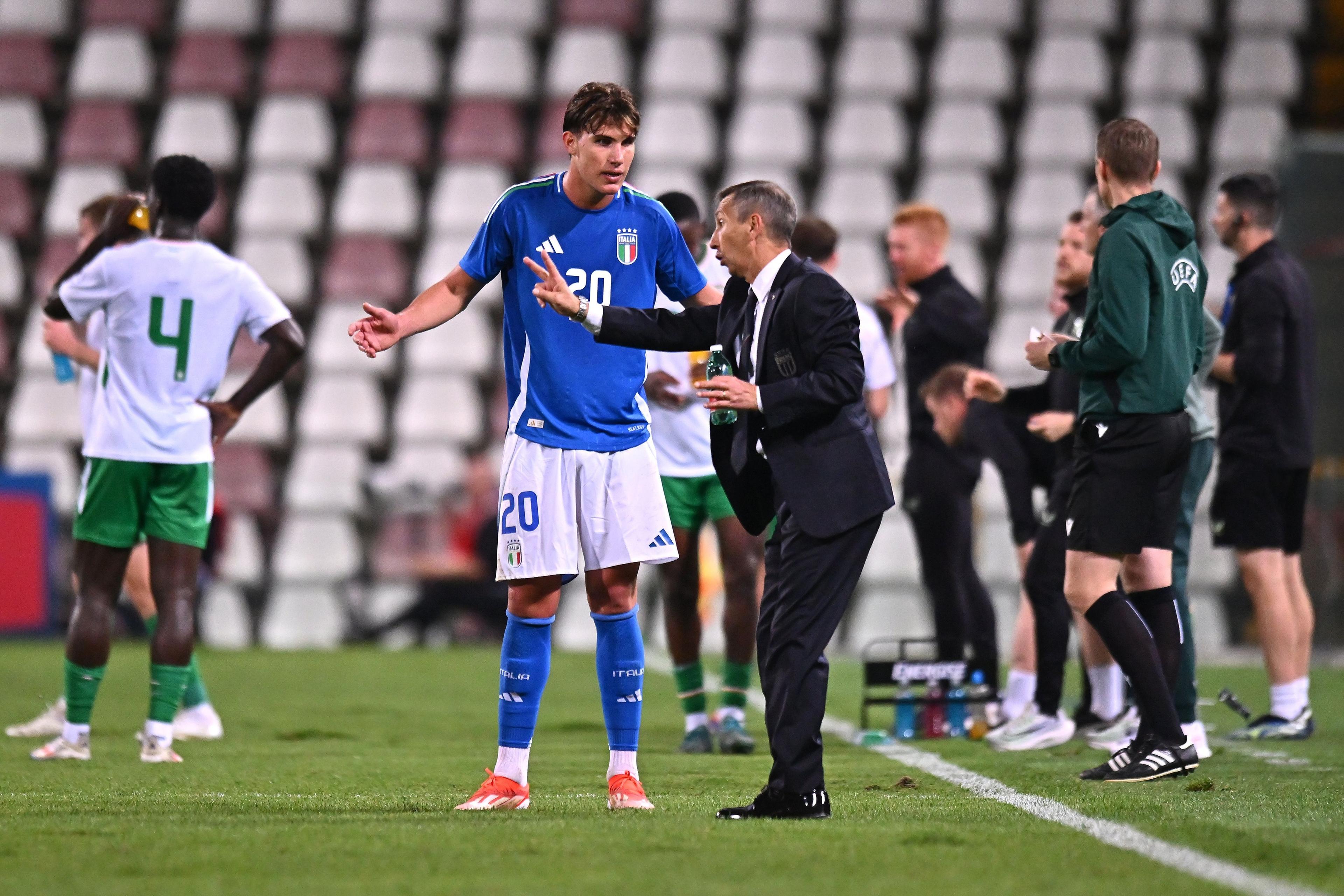 TRIESTE, ITALY - OCTOBER 15: Carmine Nunziata head coach of Italy U21 issues instructions to Cesare Casadei of Italy U21 during the UEFA U21 Euro 2025 Qualifier match between Italy and Ireland at Stadio Nereo Rocco on October 15, 2024 in Trieste, Italy. (Photo by FIGC/FIGC via Getty Images