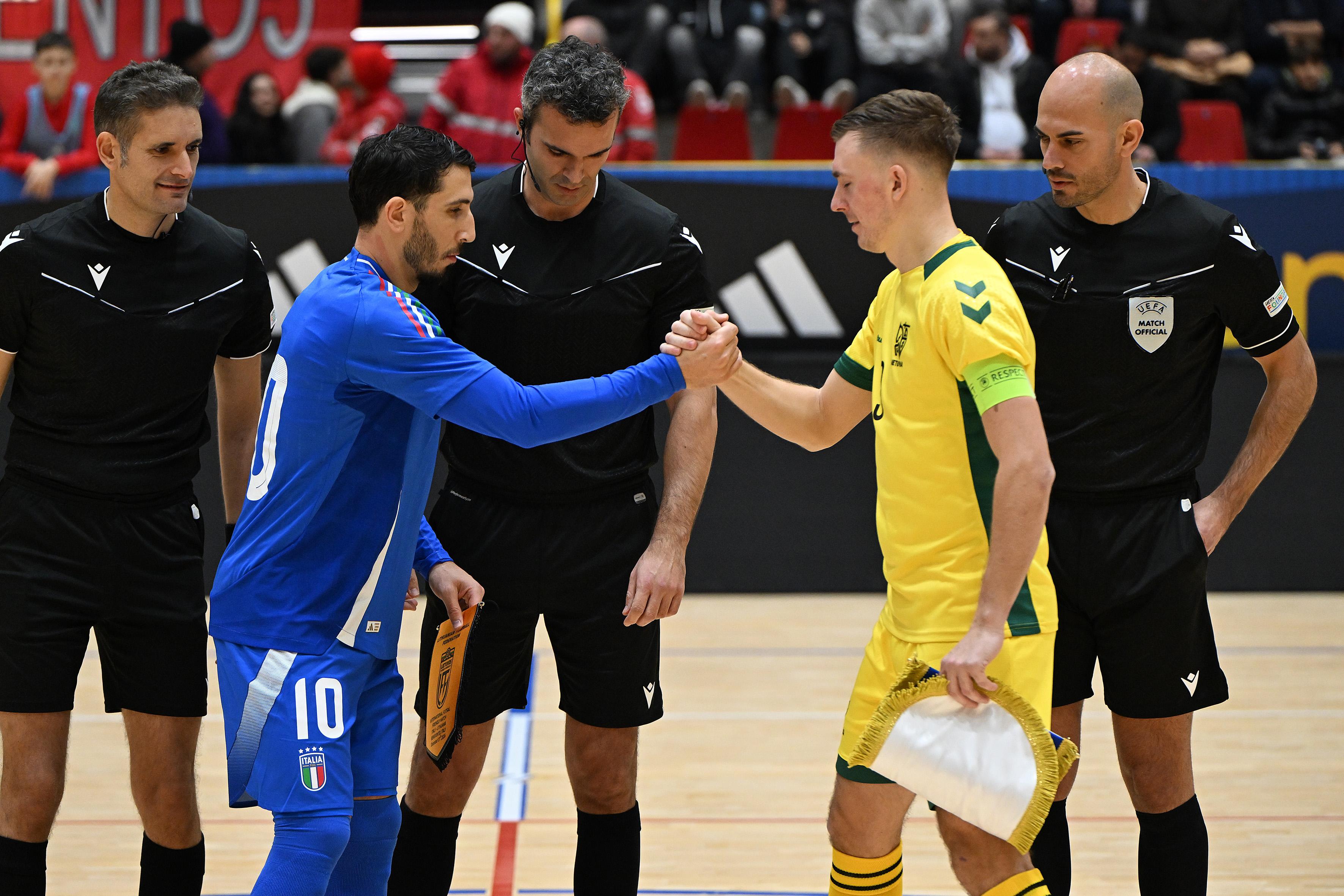 BENEVENTO, ITALY - DECEMBER 17: Carmelo Musumeci of Italy greets Justinas Zagurskas of Lithuania before the Futsal Friendly match between Italy and Lithuania on December 17, 2024 in Benevento, Italy. (Photo by FIGC/FIGC via Getty Images)
