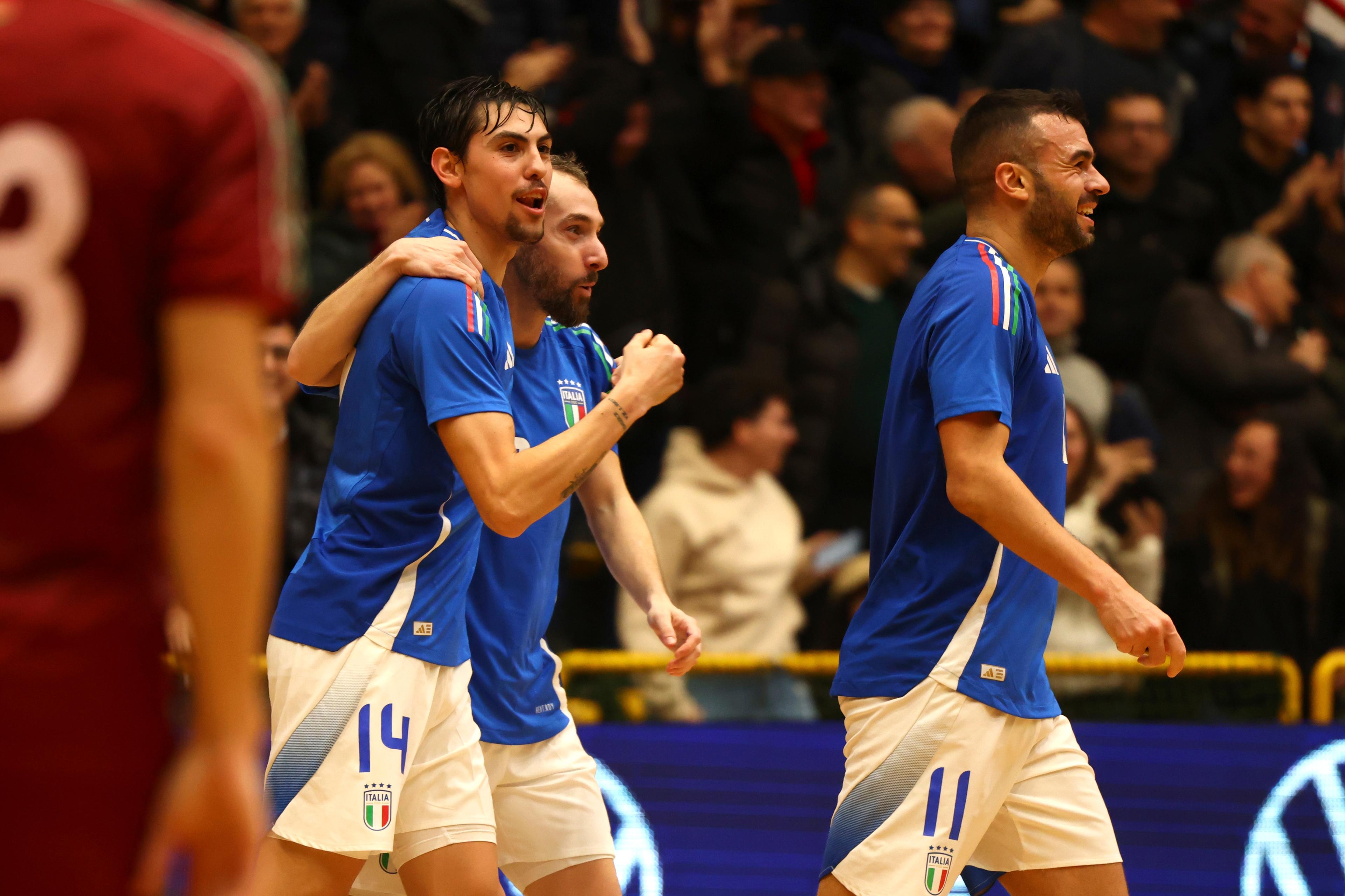 CATANIA, ITALY - JANUARY 30: Murilo Schiochet of Italy celebrates with their teammates after scoring his team\\'s equalizing goal during the Futsal EURO 2026 Qualifyier match beetween Italy and Belarus on January 30, 2025 in PalaCatania, Catania, Italy. (Photo by FIGC/FIGC via Getty Images)