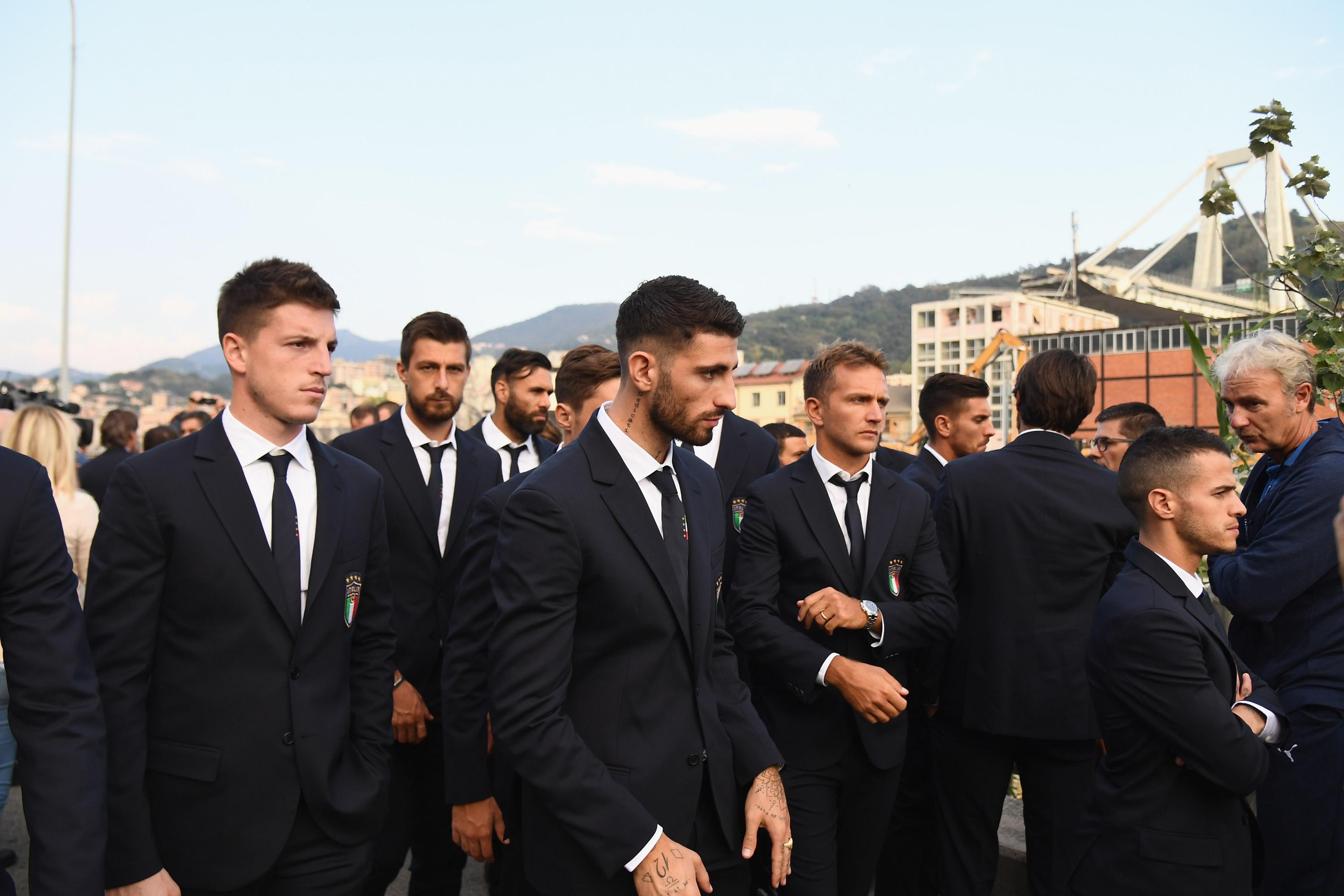 GENOA, ITALY - OCTOBER 09:  Italy players visit the Ponte Morandi collapsed on August 14 in Genoa causing the death of 43 people at Ponte Morandi on October 9, 2018 in Genoa, Italy.  (Photo by Claudio Villa/Getty Images)