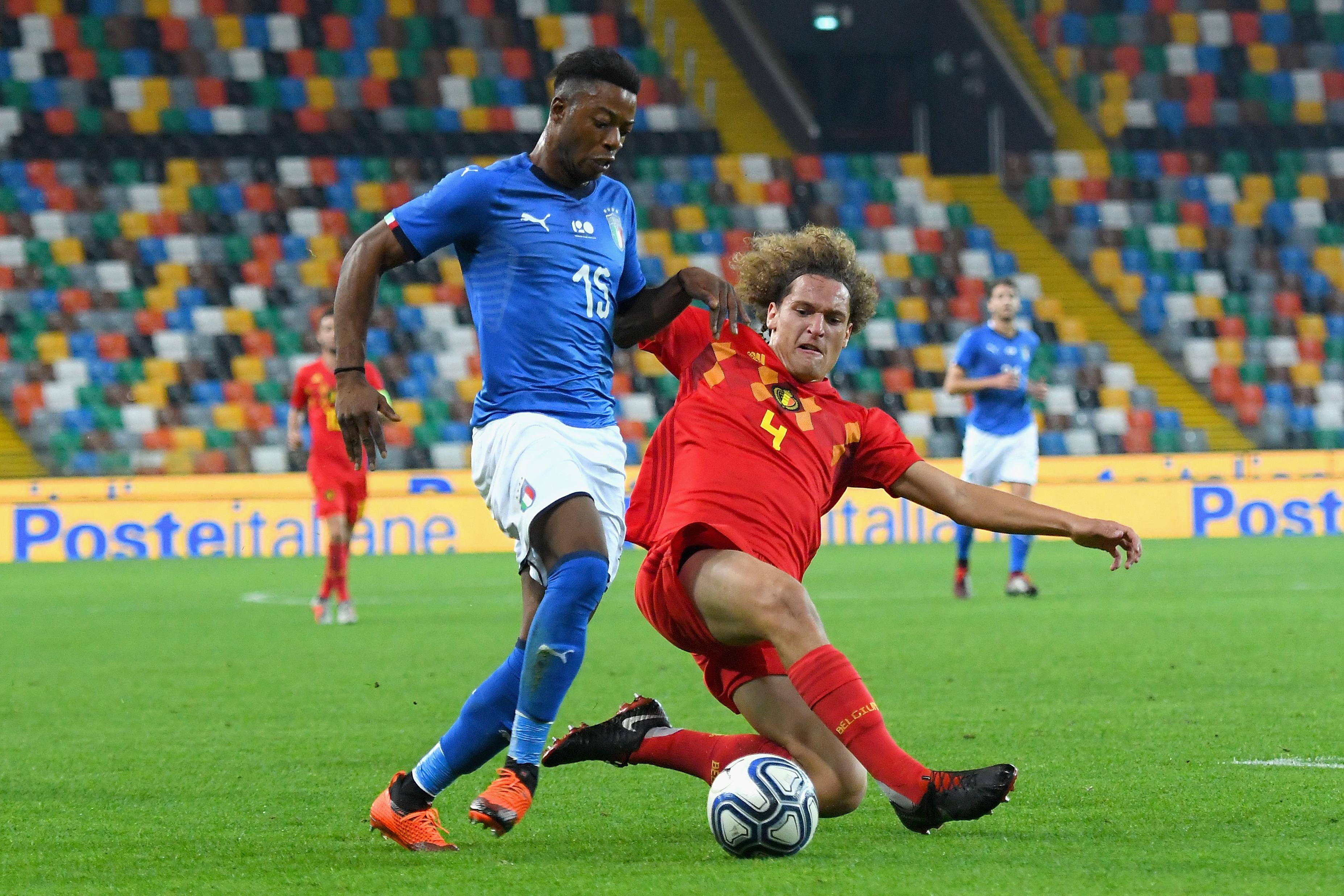 UDINE, ITALY - OCTOBER 11: Claud Adjapong of Italy U21 competes for the ball with Wout Faes of Belgium U21 during the International Friendly match between Italy U21 and Belgium U21 at Friuli Stadium on October 11, 2018 in Udine, Italy.  (Photo by Alessandro Sabattini/Getty Images)