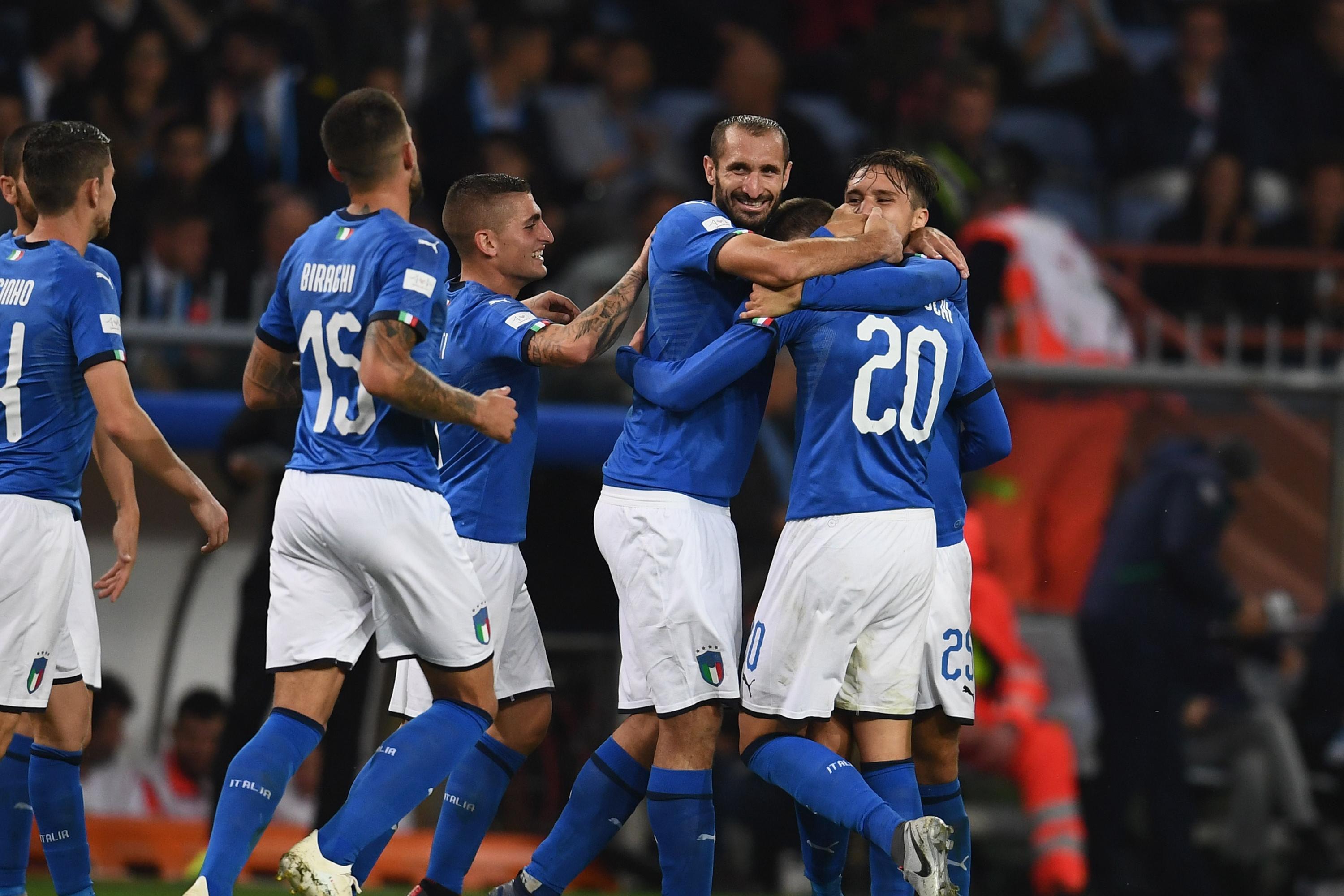 GENOA, ITALY - OCTOBER 10:  Federico Bernardeschi of Italy celebrates with team-mates after scoring the opening goal during the International Friendly match between Italy and Ukraine on October 10, 2018 in Genoa, Italy.  (Photo by Claudio Villa/Getty Images)