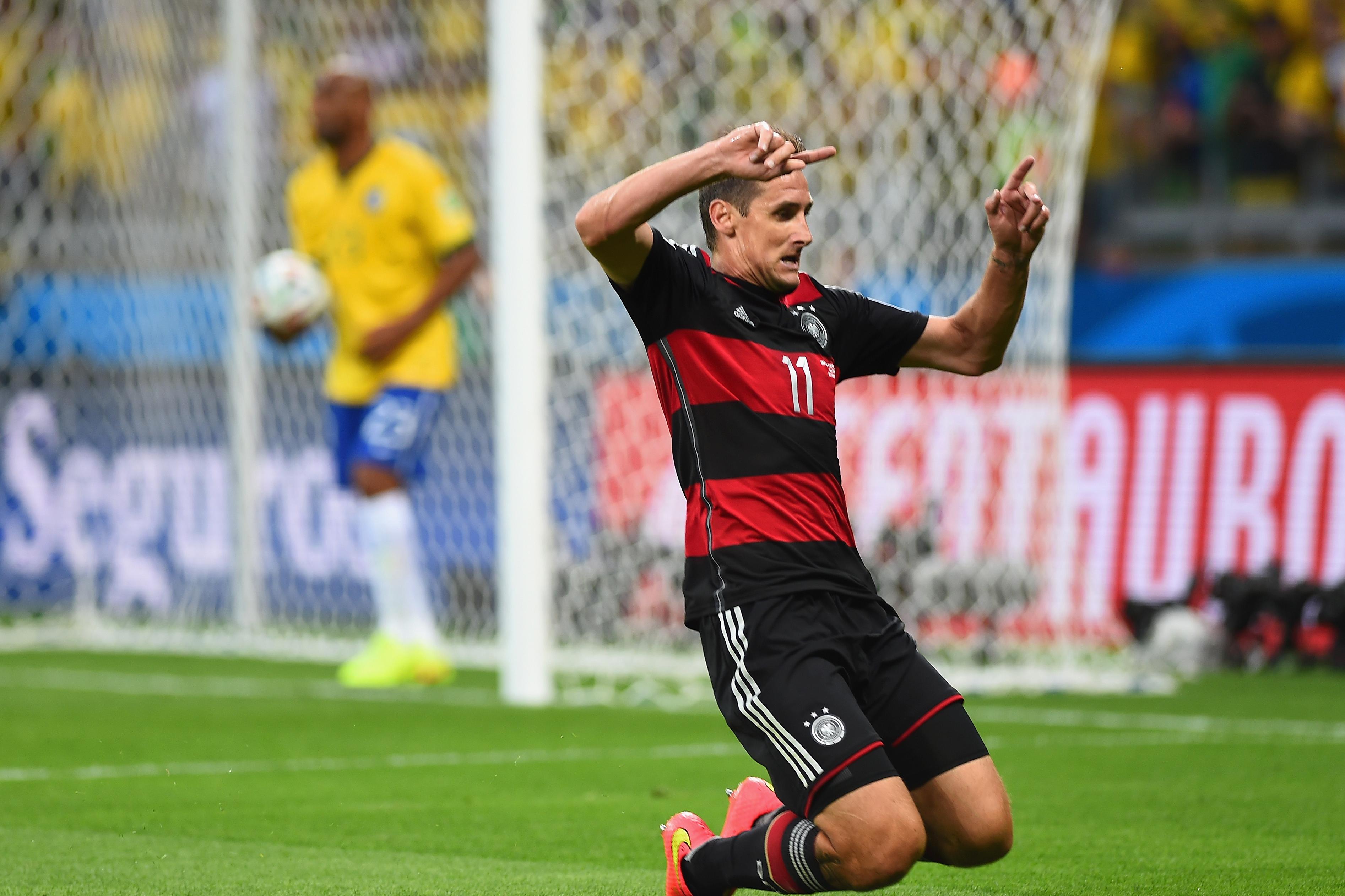 BELO HORIZONTE, BRAZIL - JULY 08:  Miroslav Klose of Germany celebrates scoring his team\\'s second goal during the 2014 FIFA World Cup Brazil Semi Final match between Brazil and Germany at Estadio Mineirao on July 8, 2014 in Belo Horizonte, Brazil.  (Photo by Laurence Griffiths/Getty Images)