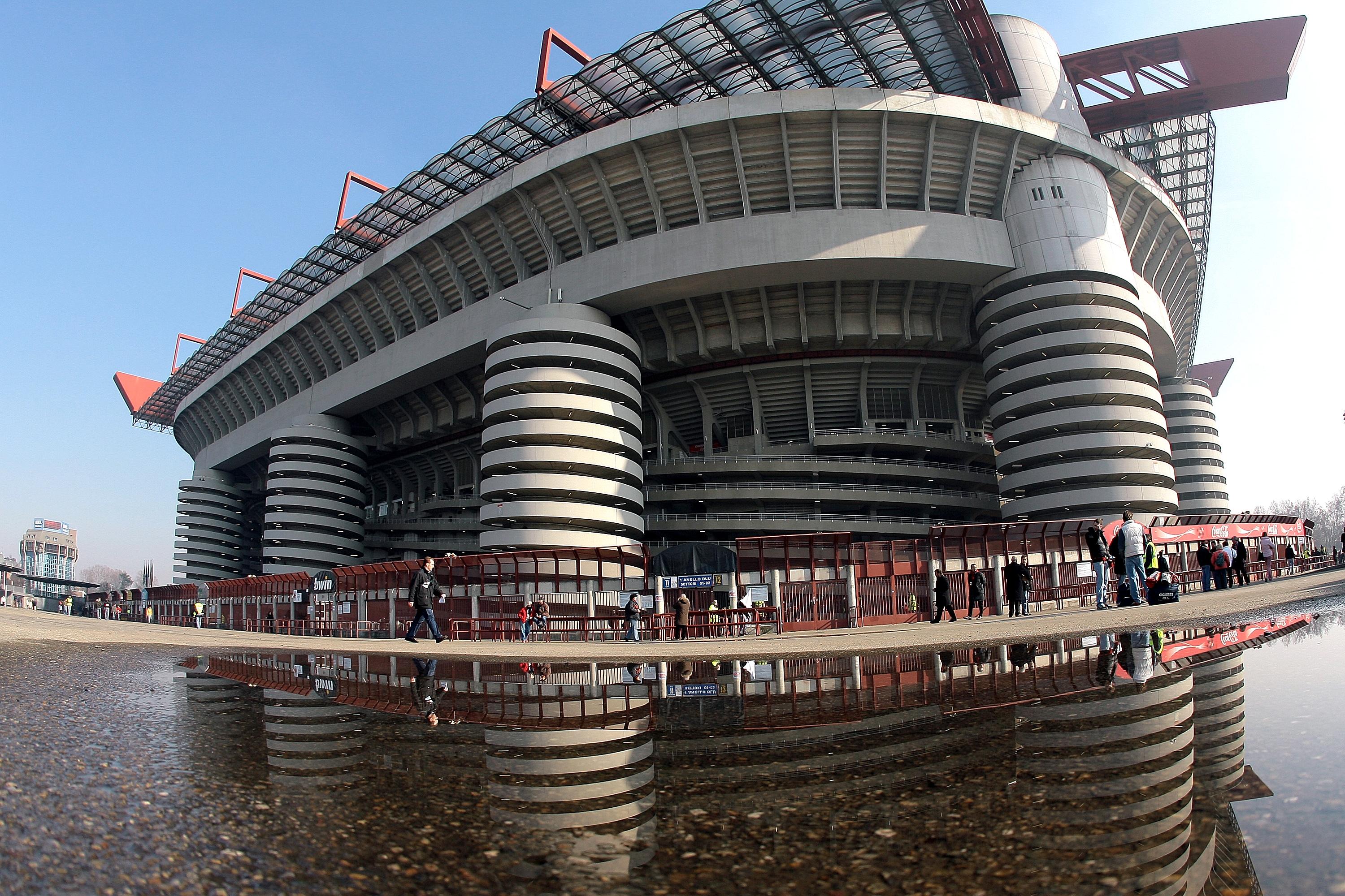 MILAN, ITALY - FEBRUARY 11: A general view of San Siro Stadium with only few fans before the AC Milan v Livorno serie A match on February 11, 2007 in Milan, Italy. Turnstiles have been installed and only AC Milan fans with season tickets will be allowd to watch the match. The security measures were installed after an officer was killed during riots at previous game in Sicily, Italy.  (Photo by Getty Images)