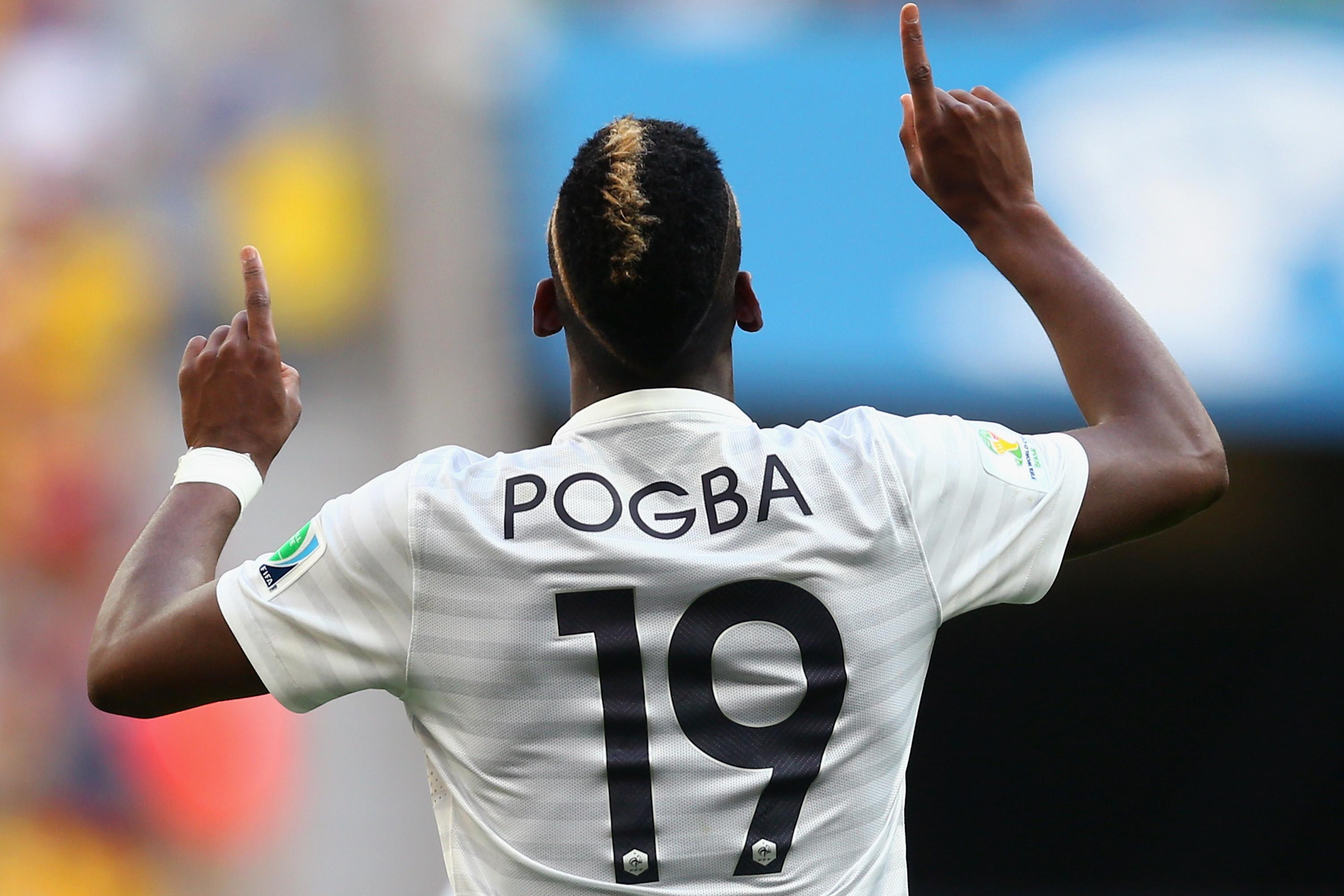 BRASILIA, BRAZIL - JUNE 30:  Paul Pogba of France celebrates scoring his team\\'s first goal during the 2014 FIFA World Cup Brazil Round of 16 match between France and Nigeria at Estadio Nacional on June 30, 2014 in Brasilia, Brazil.  (Photo by Jeff Gross/Getty Images)