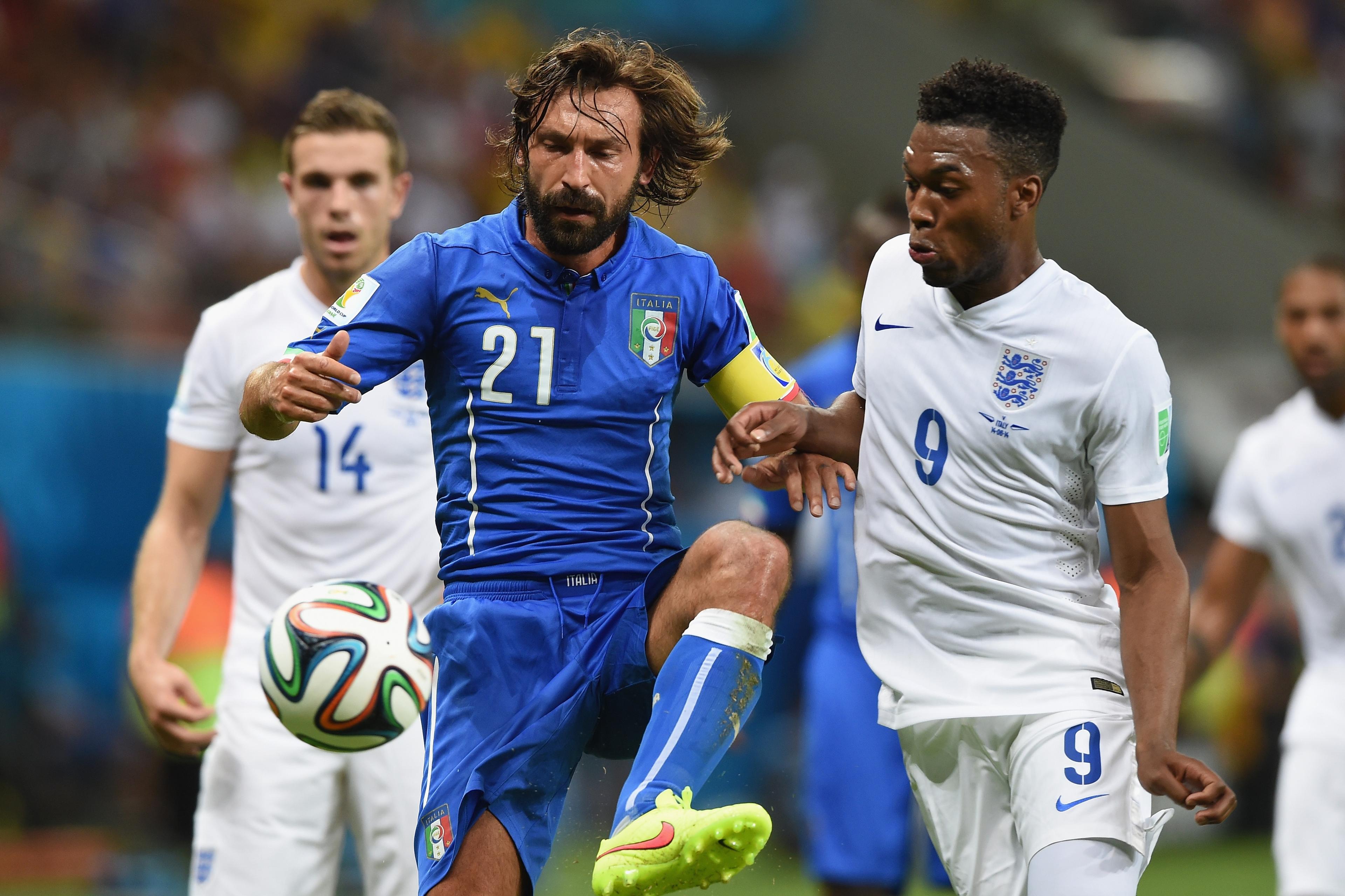 MANAUS, BRAZIL - JUNE 14: Andrea Pirlo of Italy controls the ball against Daniel Sturridge of England during the 2014 FIFA World Cup Brazil Group D match between England and Italy at Arena Amazonia on June 14, 2014 in Manaus, Brazil. (Photo by Claudio Villa/Getty Images)