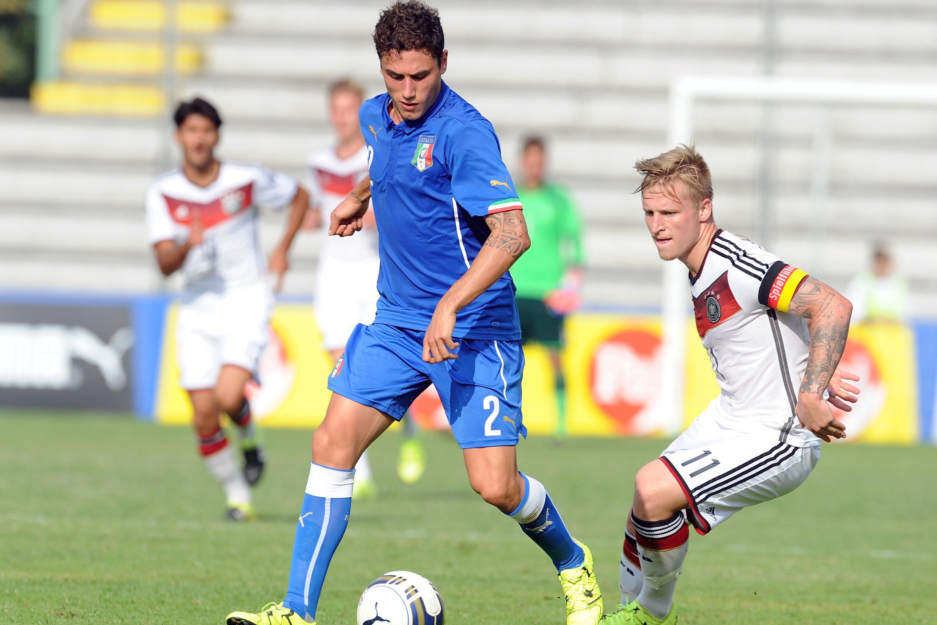 LUCCA, ITALY - SEPTEMBER 03:  (L-R) Davide Calabria of Italy competes for the ball with Marvin Stefaniak of Germany during the football match U20 Italy and U20 Germany international friendly on September 3, 2015 in Lucca, Italy.  (Photo by Pier Marco Tacca/Bongarts/Getty Images)