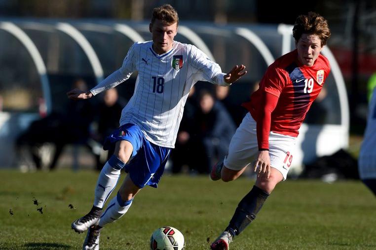 BURTON-UPON-TRENT, ENGLAND - FEBRUARY 18:  during the Norway v Italy U16s Giorgio Losa of Italt is challenged by Kristian Bjamer of Noeway International Friendly at St Georges Park on February 18, 2016 in Burton-upon-Trent, England.  (Photo by Ross Kinnaird/Getty Images)