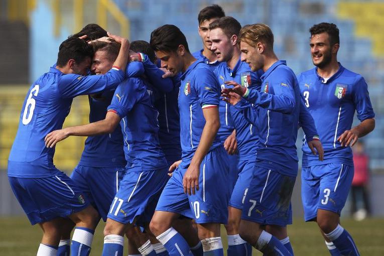 \"LECCO, ITALY - MARCH 09:  Luca Matarese (2nd L) of Italy celebrates with his team-mates after scoring the opening goal during the U18 international friendly match between Italy and Switzerland on March 9, 2016 in Lecco, Italy.  (Photo by Marco Luzzani/Getty Images)\"