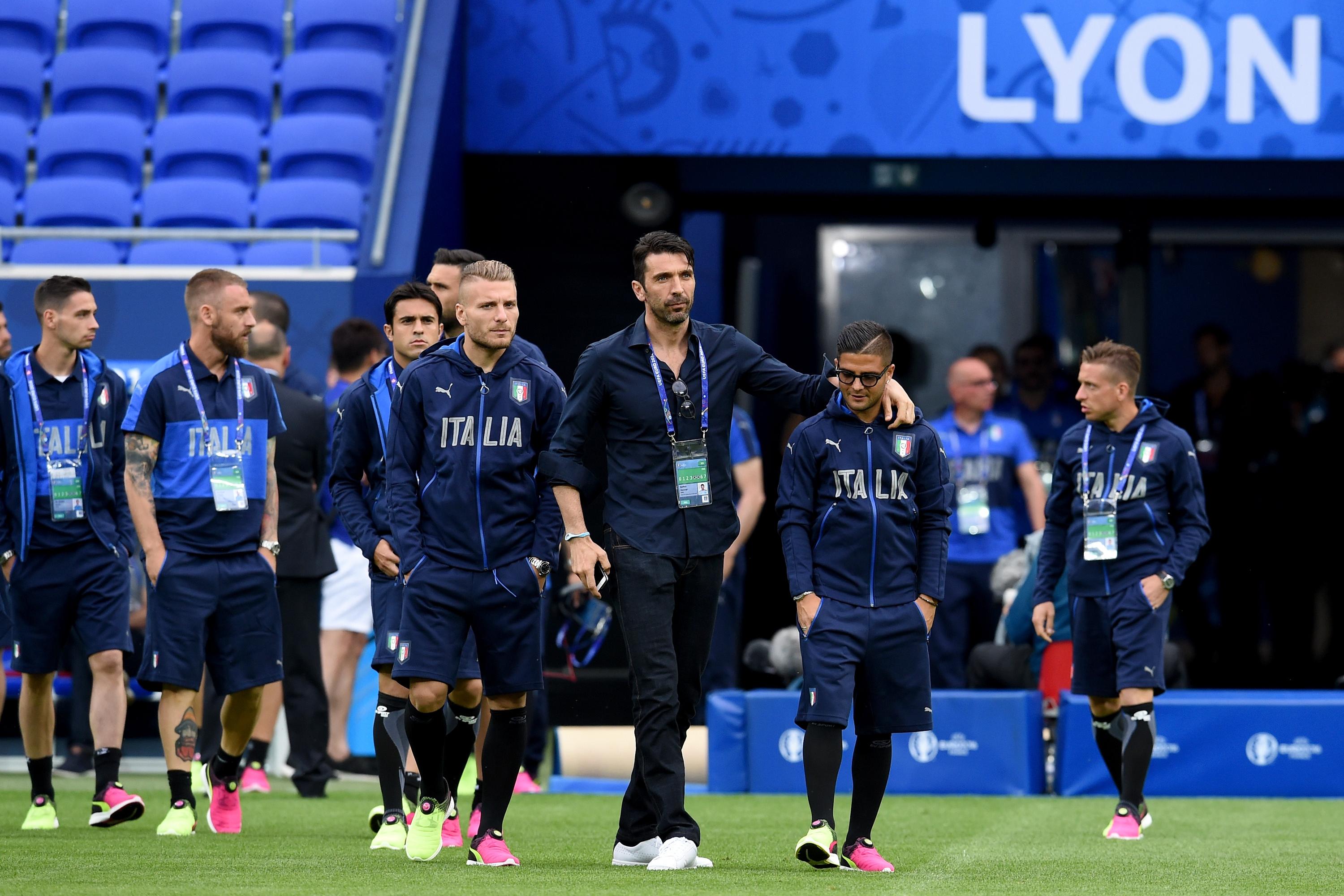 LYON, FRANCE - JUNE 12:  (L-R) Ciro Immobile, Gianluigi Buffon and Lorenzo Insigne of Italy chat into the pitch ahead of their UEFA Euro 2016 Group E match between Belgium and Italy at Stade de Lyon on June 12, 2016 in Lyon, France.  (Photo by Claudio Villa/Getty Images)