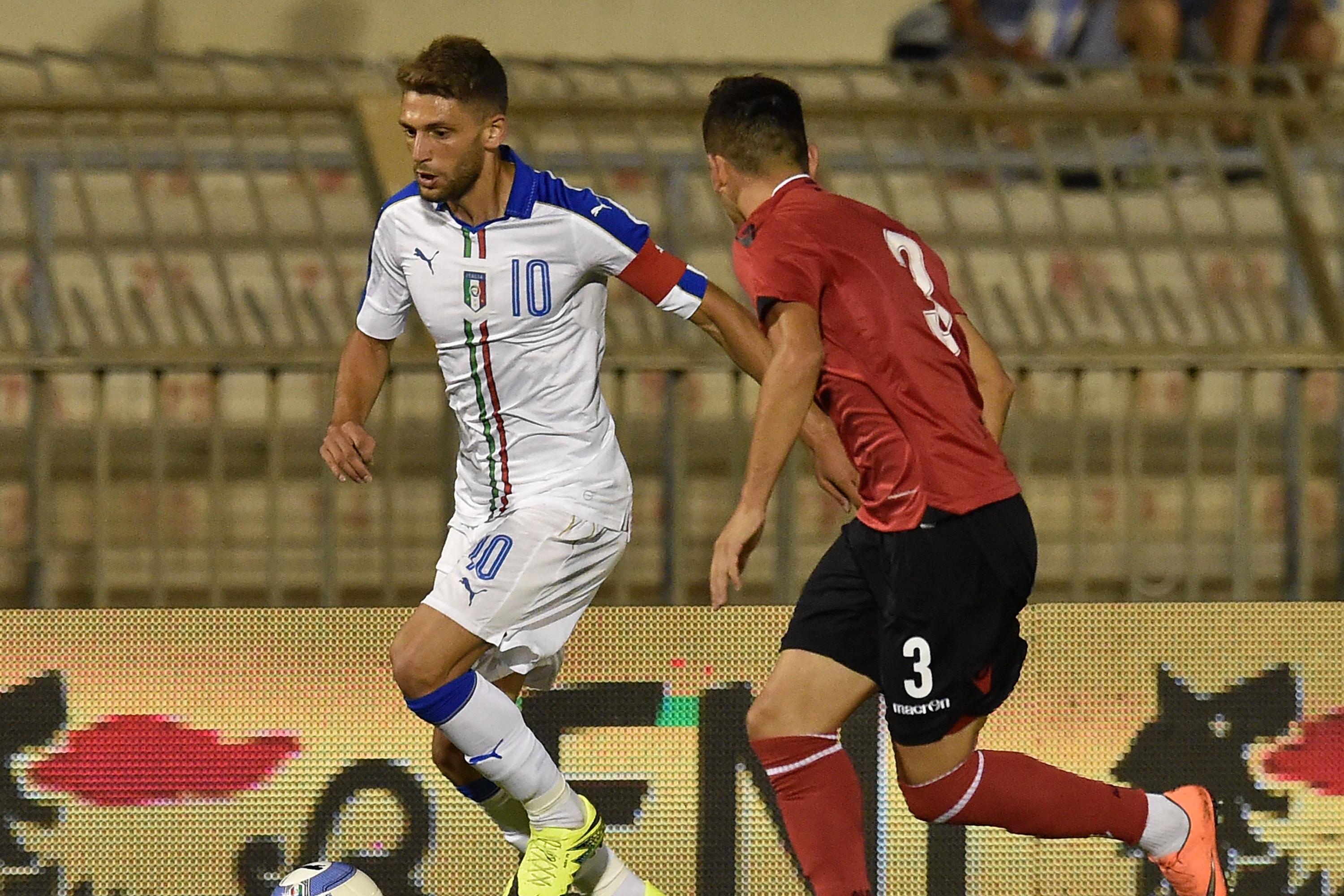 SAN BENEDETTO DEL TRONTO, ITALY - AUGUST 10:  Domenico Berardi of Italy U21 and Erion Hoxhallari of Albania U21 in action during the international friendly match between Italy U21 and Albania U21 at Stadio Riviera delle Palme on August 10, 2016 in San Benedetto del Tronto, Italy.  (Photo by Giuseppe Bellini/Getty Images)