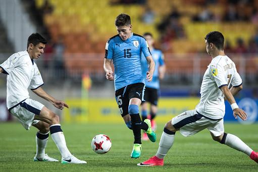 SUWON, SOUTH KOREA - MAY 21:  Matteo Pessina of Italy and Riccardo Orsolini of Italy challenges Facundo Waller of Uruguay during the FIFA U-20 World Cup Korea Republic 2017 group D match between Italy and Uruguay at Suwon World Cup Stadium on May 21, 2017 in Suwon, South Korea.  (Photo by Lars Baron - FIFA/FIFA via Getty Images)