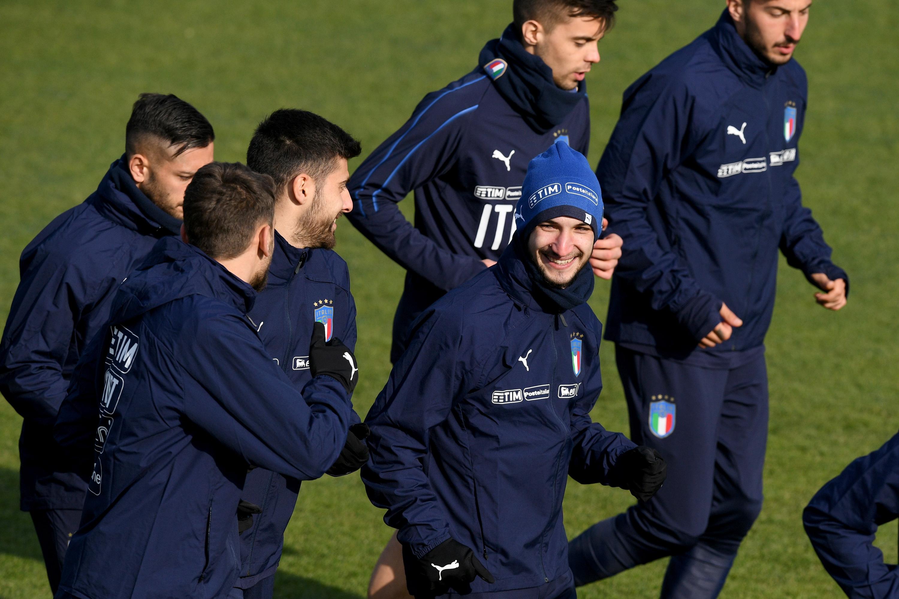 FLORENCE, ITALY - FEBRUARY 26: Matteo Politano of Italy (C) smiles during a training session at Italy club\\'s training ground at Coverciano at Coverciano on February 26, 2018 in Florence, Italy. (Photo by Claudio Villa/Getty Images)