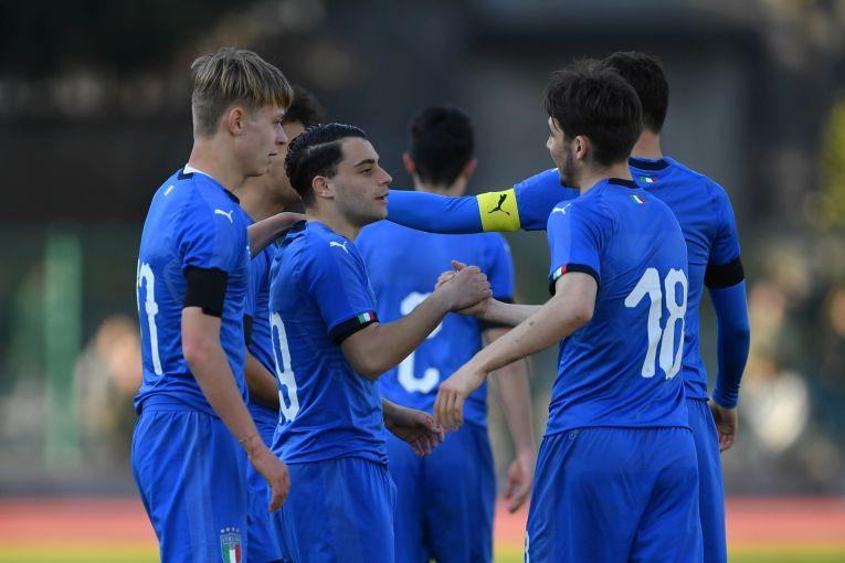 BIELLA, ITALY - MARCH 23: Davide Merola (C) of Italy U18 celebrates a goal with team mate Lorenzo Peli (R) during the international friendly match between Italy U18 and Netherlands U18 on March 23, 2018 in Biella, Italy. (Photo by Valerio Pennicino/Getty Images)