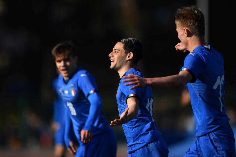 BIELLA, ITALY - MARCH 23: Davide Merola (C) of Italy U18 celebrates a goal during the international friendly match between Italy U18 and Netherlands U18 on March 23, 2018 in Biella, Italy. (Photo by Valerio Pennicino/Getty Images)