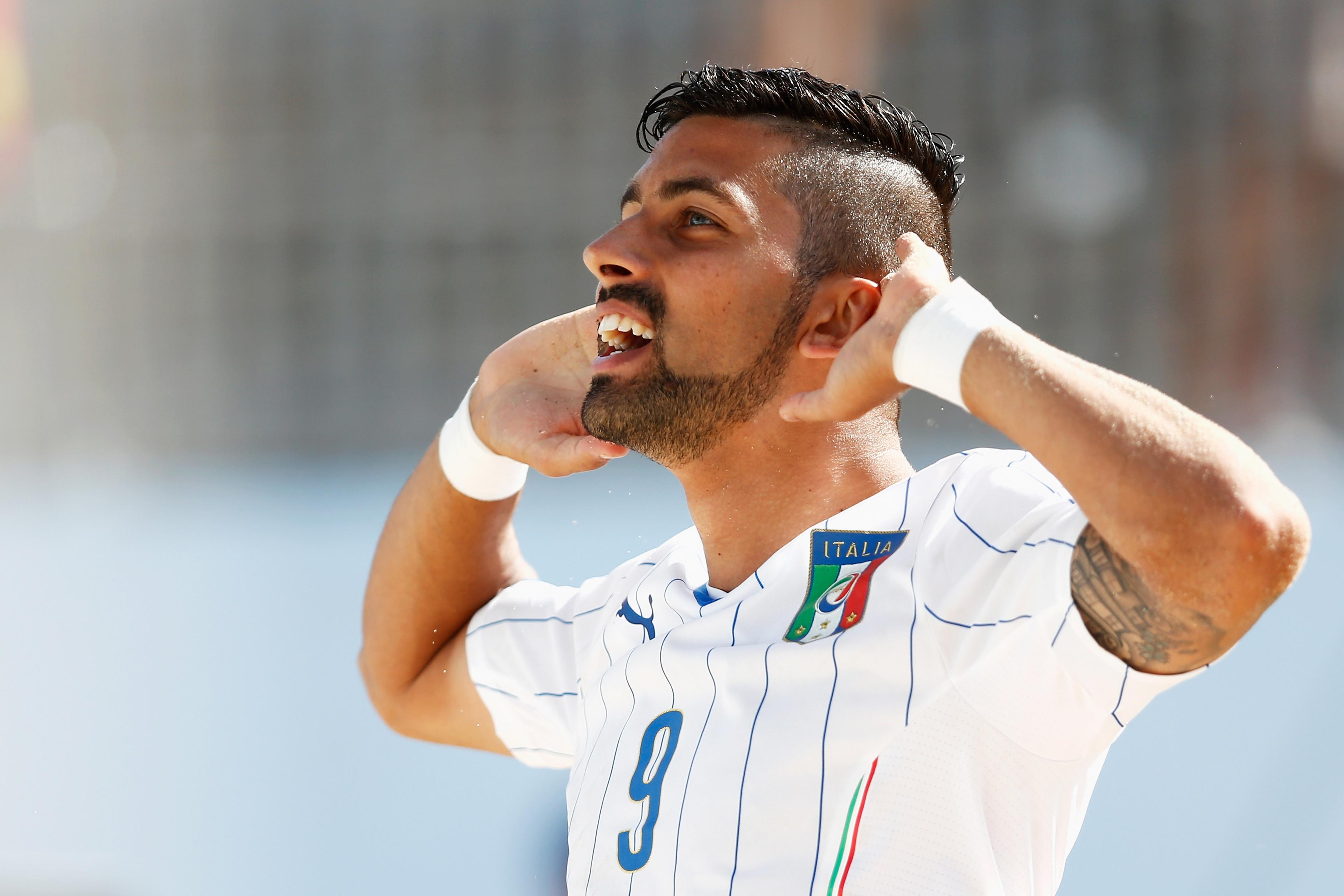 ESPINHO, PORTUGAL - JULY 16: Emmanuele Zurlo of Italy celebrates scoring his teams first goal of the game during the FIFA Beach Soccer World Cup quarter final match between Italy and Japan held at Espinho Stadium on July 16, 2015 in Espinho, Portugal. (Photo by Dean Mouhtaropoulos - FIFA/FIFA via Getty Images)