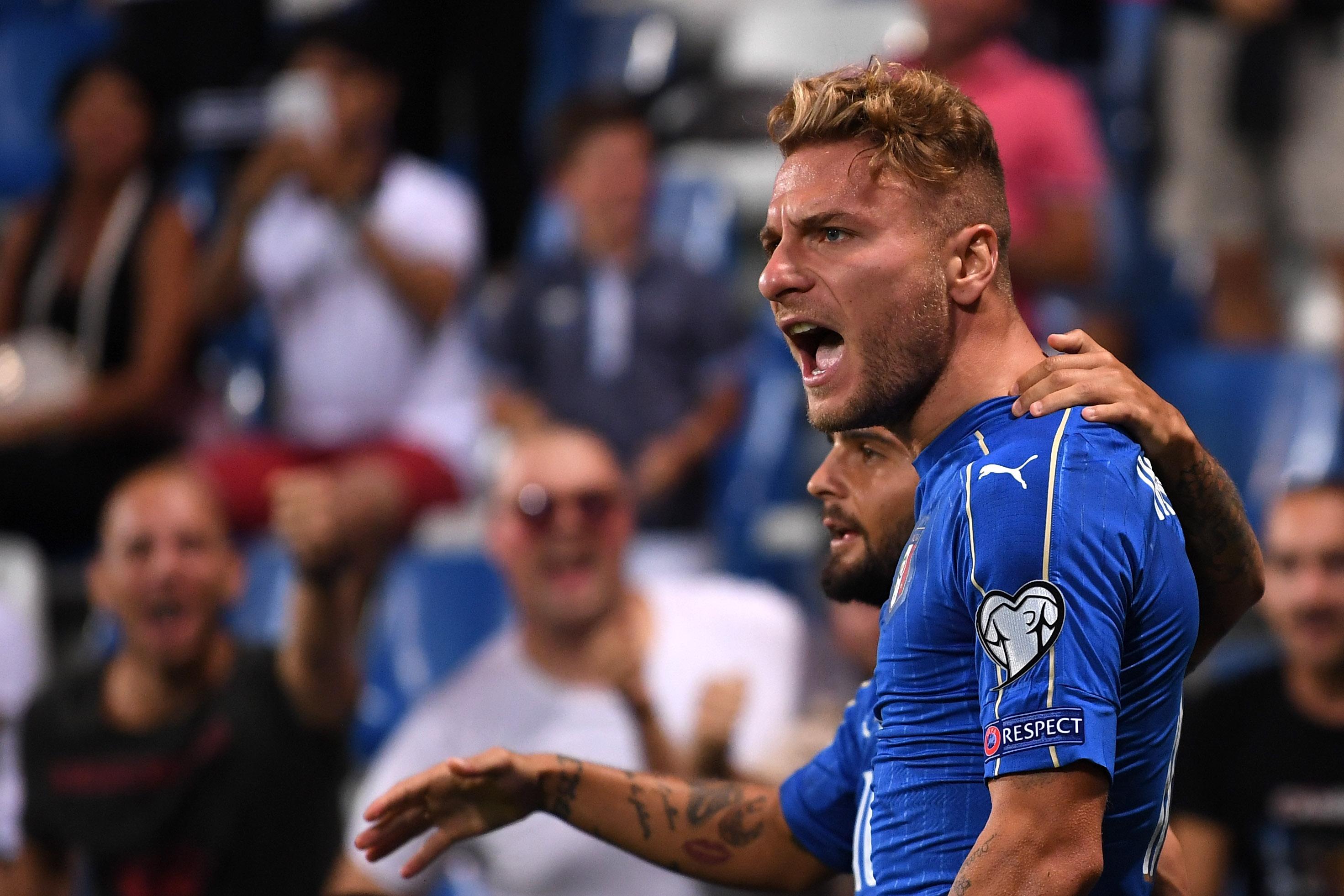 REGGIO NELL\\'EMILIA, ITALY - SEPTEMBER 05:  Ciro Immobile of Italy celebrates with Lorenzo Insigne after scoring the opening goal during the FIFA 2018 World Cup Qualifier between Italy and Israel at Mapei Stadium - Citta\\' del Tricolore on September 5, 2017 in Reggio nell\\'Emilia, Italy.  (Photo by Valerio Pennicino/Getty Images)