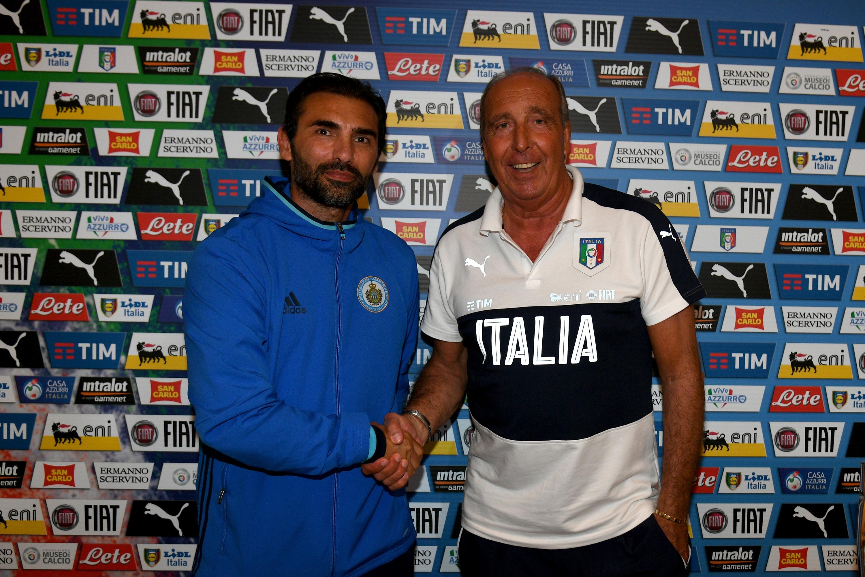 FLORENCE, ITALY - MAY 30: Head coach Italy Gian Piero Ventura (R) and head coach San Marino Pierangelo Manzaroli pose for a photo during the press conference at Coverciano at Coverciano on May 30, 2017 in Florence, Italy. (Photo by Claudio Villa/Getty Images)