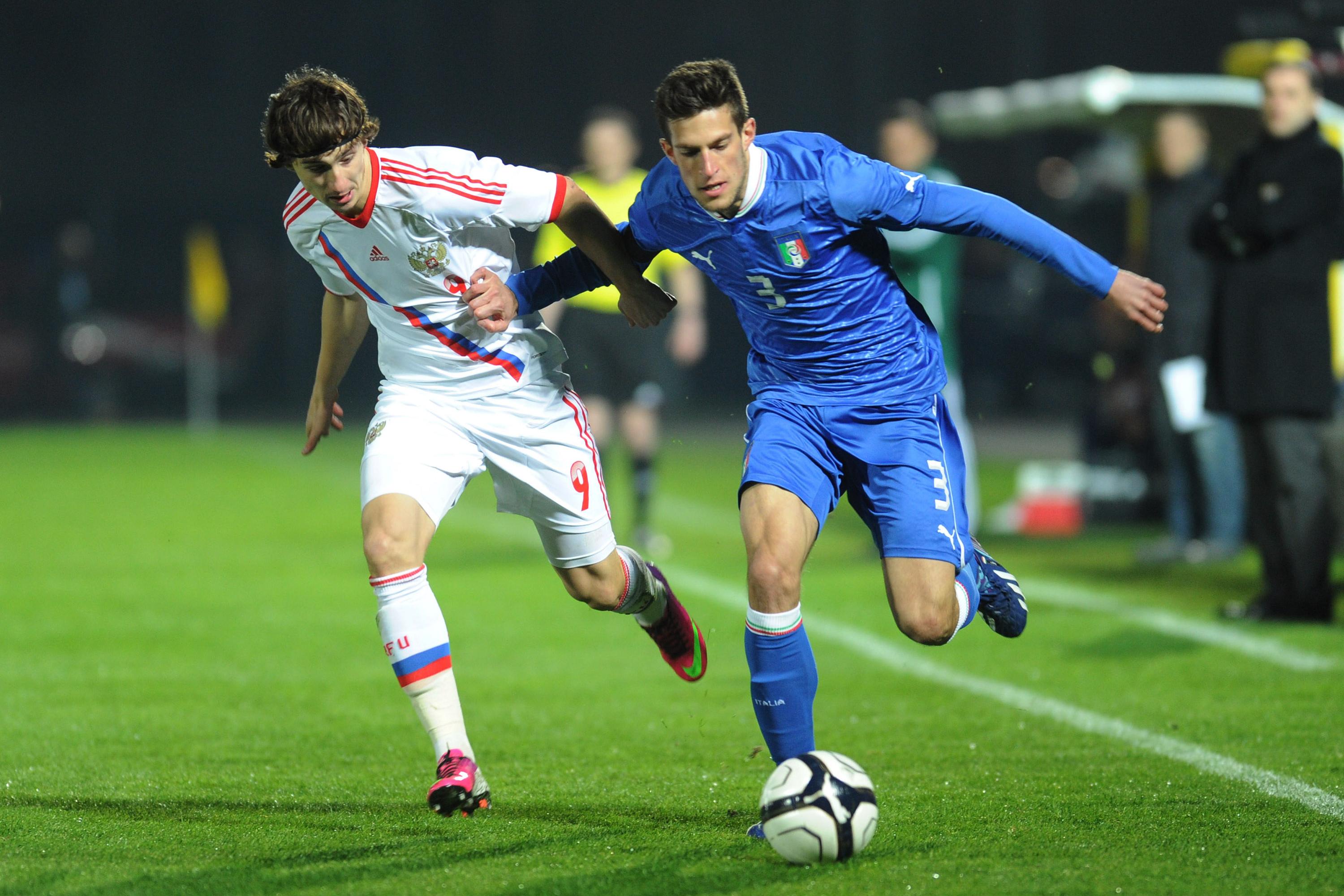 CITTADELLA, ITALY - MARCH 22: Cristiano Biraghi of Italy U21 (R) competes with Pavel Yakovlev of Russia U21 during the international friendly match between Italy U21 and Russia U21 at Stadio Pier Cesare Tombolato on March 22, 2013 in Cittadella, Italy. (Photo by Dino Panato/Getty Images)
