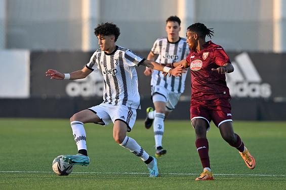VINOVO, ITALY - NOVEMBER 26: Adam Boufandar of Juventus U17 evades a challenge from Habtamu Gasti of Torino U17 during the U17 Serie A/B match between Juventus U17 and Torino U17 at Juventus Center Vinovo on November 26, 2022 in Vinovo, Italy. (Photo by Chris Ricco - Juventus FC/Juventus FC via Getty Images)