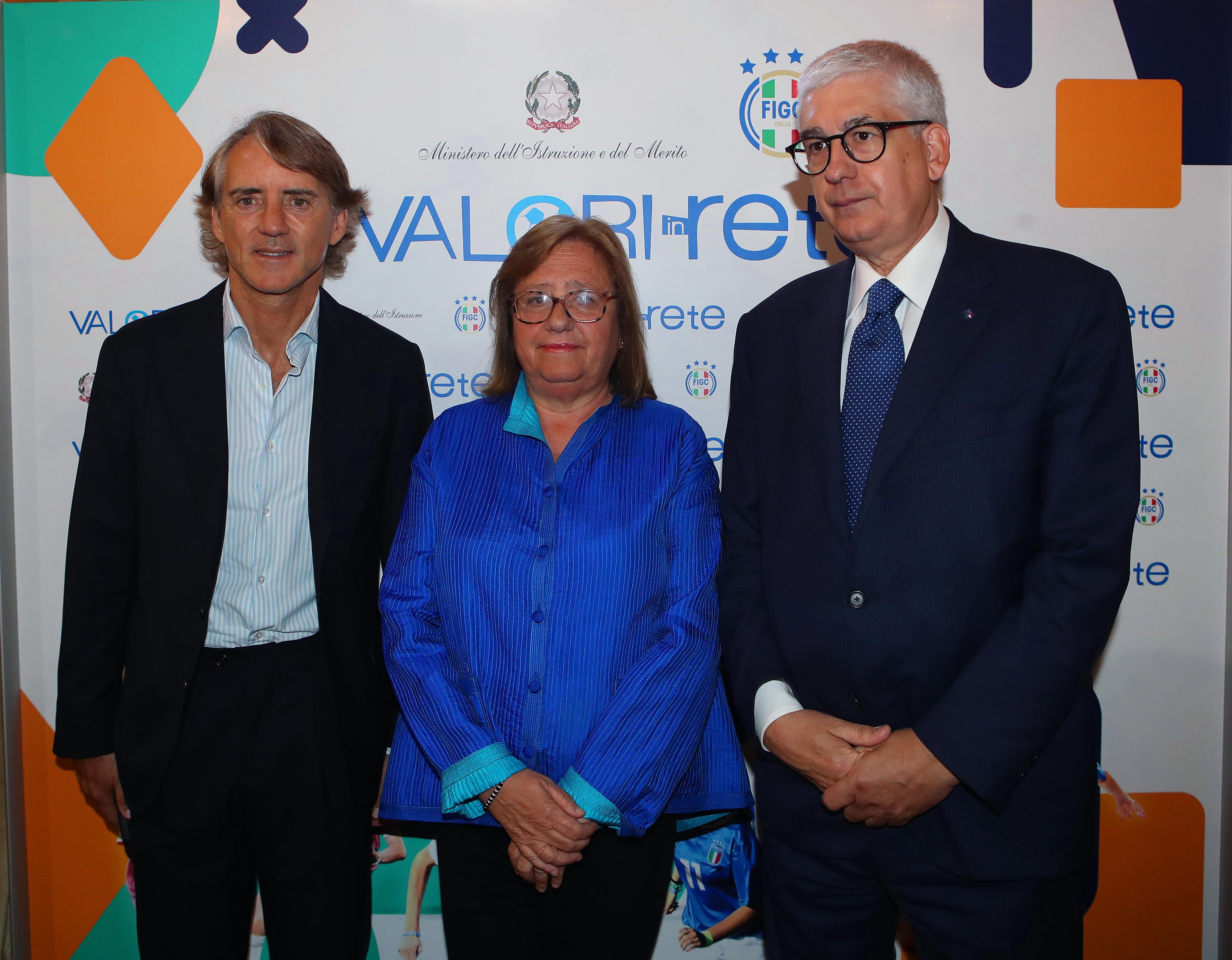 ROME, ITALY - MAY 25: Italy head coach Roberto Mancini, Paola Frassinetti of Education Ministry, and Vito Tisci of FIGC pose during FIGC 'Valori In Rete' event at Education Ministry on May 25, 2023 in Rome, Italy. (Photo by Paolo Bruno/Getty Images)