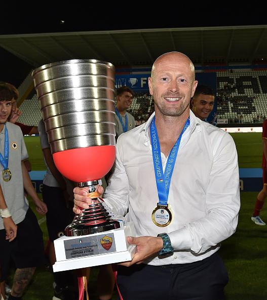 ASCOLI PICENO, ITALY - JUNE 25: Gianluca Falsini head coach of AS Roma celebrates the victory after the Serie A-B U16 Final match between AC Milan and AS Roma at Stadio Cino e Lillo Del Duca on June 25, 2022 in Ascoli Piceno, Italy. (Photo by Giuseppe Bellini/Getty Images)