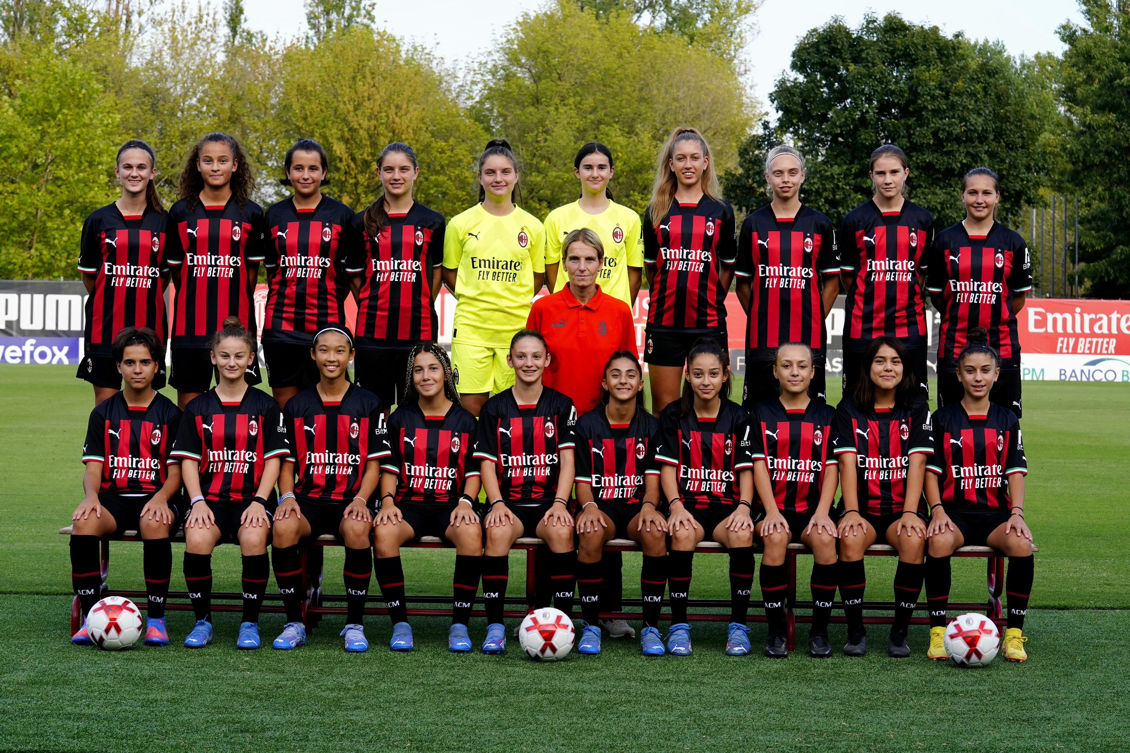 MILAN, ITALY - SEPTEMBER 12: Team of AC Milan Women Giovanissime U15 pose with Head Coach Ilenia Prati at Campo Sportivo Vismara on September 12, 2022 in Milan, Italy. (Photo by Pier Marco Tacca/AC Milan via Getty Images)